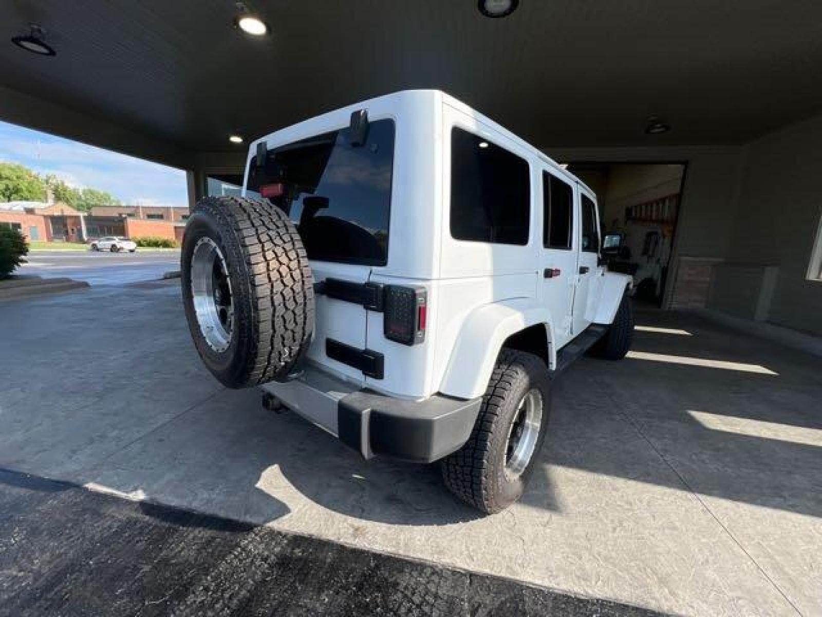 2017 Bright White Clear Coat Jeep Wrangler Unlimited Sahara (1C4HJWEG6HL) with an 3.6L V6 285hp 260ft. lbs. engine, Automatic transmission, located at 25355 Eames Street, Channahon, IL, 60410, (815) 467-1807, 41.429108, -88.228432 - CLEAN LOW MILE LOADED SAHARA! HEATED LEATHER! HARD TOP! If you're ready for a different, no hassle and pleasant car buying experience, then give us a chance! We're breaking the standard Car Sales mold and making one of our very own you'll be sure to appreciate! So, why buy from Crase Auto Connectio - Photo #3