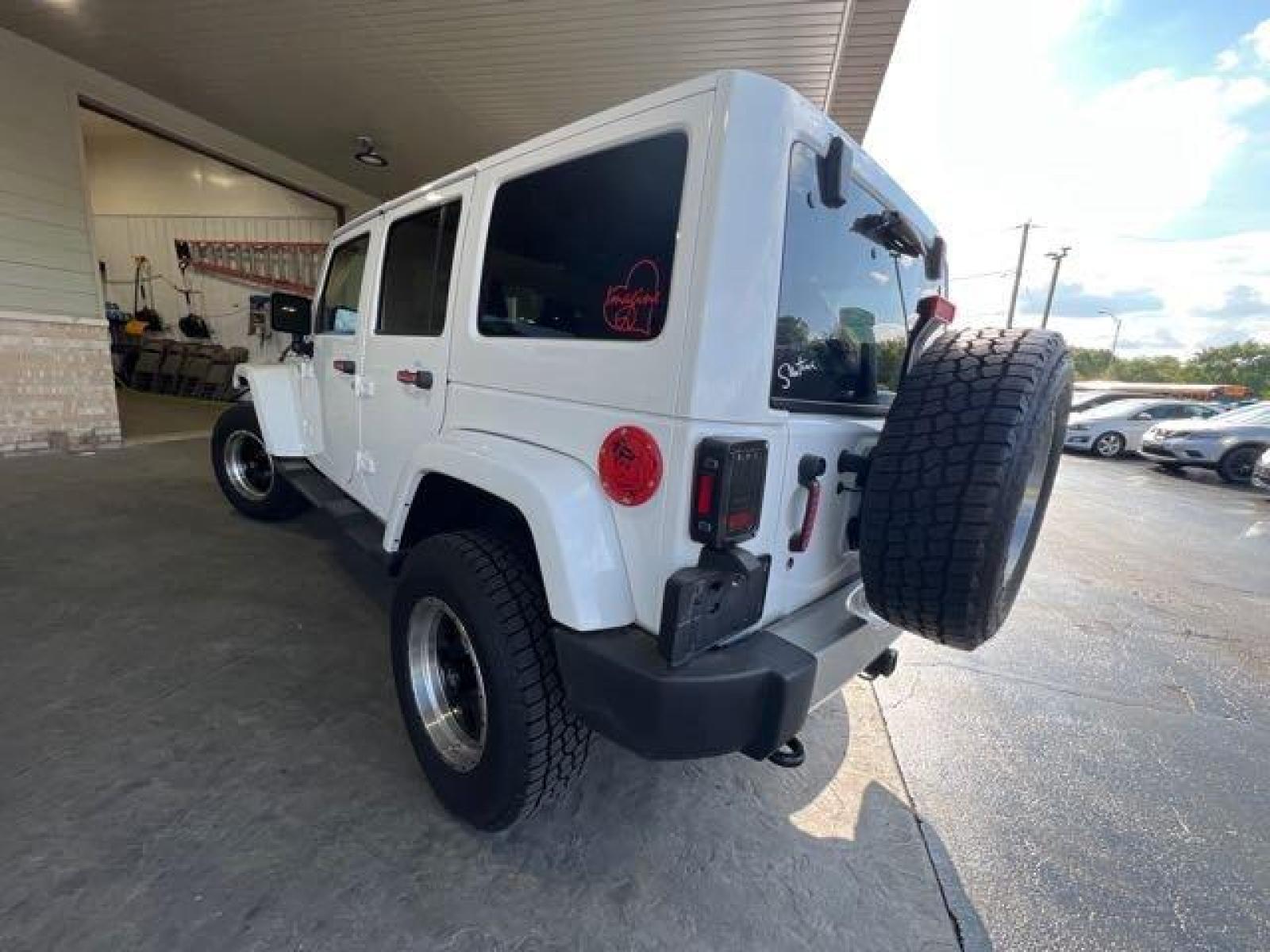 2017 Bright White Clear Coat Jeep Wrangler Unlimited Sahara (1C4HJWEG6HL) with an 3.6L V6 285hp 260ft. lbs. engine, Automatic transmission, located at 25355 Eames Street, Channahon, IL, 60410, (815) 467-1807, 41.429108, -88.228432 - CLEAN LOW MILE LOADED SAHARA! HEATED LEATHER! HARD TOP! If you're ready for a different, no hassle and pleasant car buying experience, then give us a chance! We're breaking the standard Car Sales mold and making one of our very own you'll be sure to appreciate! So, why buy from Crase Auto Connectio - Photo #5