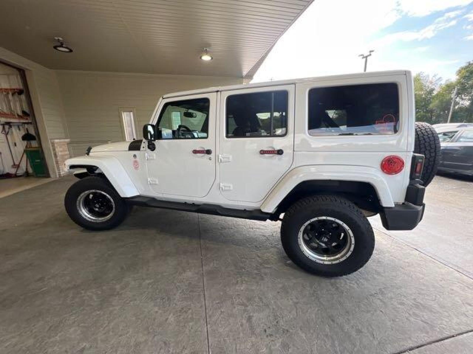 2017 Bright White Clear Coat Jeep Wrangler Unlimited Sahara (1C4HJWEG6HL) with an 3.6L V6 285hp 260ft. lbs. engine, Automatic transmission, located at 25355 Eames Street, Channahon, IL, 60410, (815) 467-1807, 41.429108, -88.228432 - CLEAN LOW MILE LOADED SAHARA! HEATED LEATHER! HARD TOP! If you're ready for a different, no hassle and pleasant car buying experience, then give us a chance! We're breaking the standard Car Sales mold and making one of our very own you'll be sure to appreciate! So, why buy from Crase Auto Connectio - Photo #6