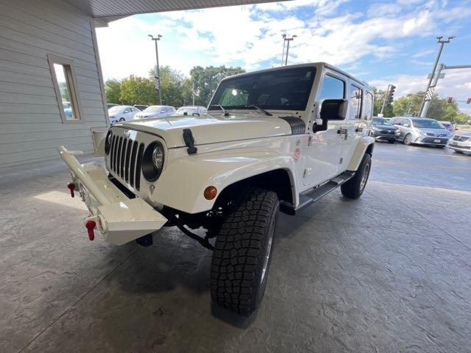 2017 Bright White Clear Coat Jeep Wrangler Unlimited Sahara (1C4HJWEG6HL) with an 3.6L V6 285hp 260ft. lbs. engine, Automatic transmission, located at 25355 Eames Street, Channahon, IL, 60410, (815) 467-1807, 41.429108, -88.228432 - CLEAN LOW MILE LOADED SAHARA! HEATED LEATHER! HARD TOP! If you're ready for a different, no hassle and pleasant car buying experience, then give us a chance! We're breaking the standard Car Sales mold and making one of our very own you'll be sure to appreciate! So, why buy from Crase Auto Connectio - Photo #7