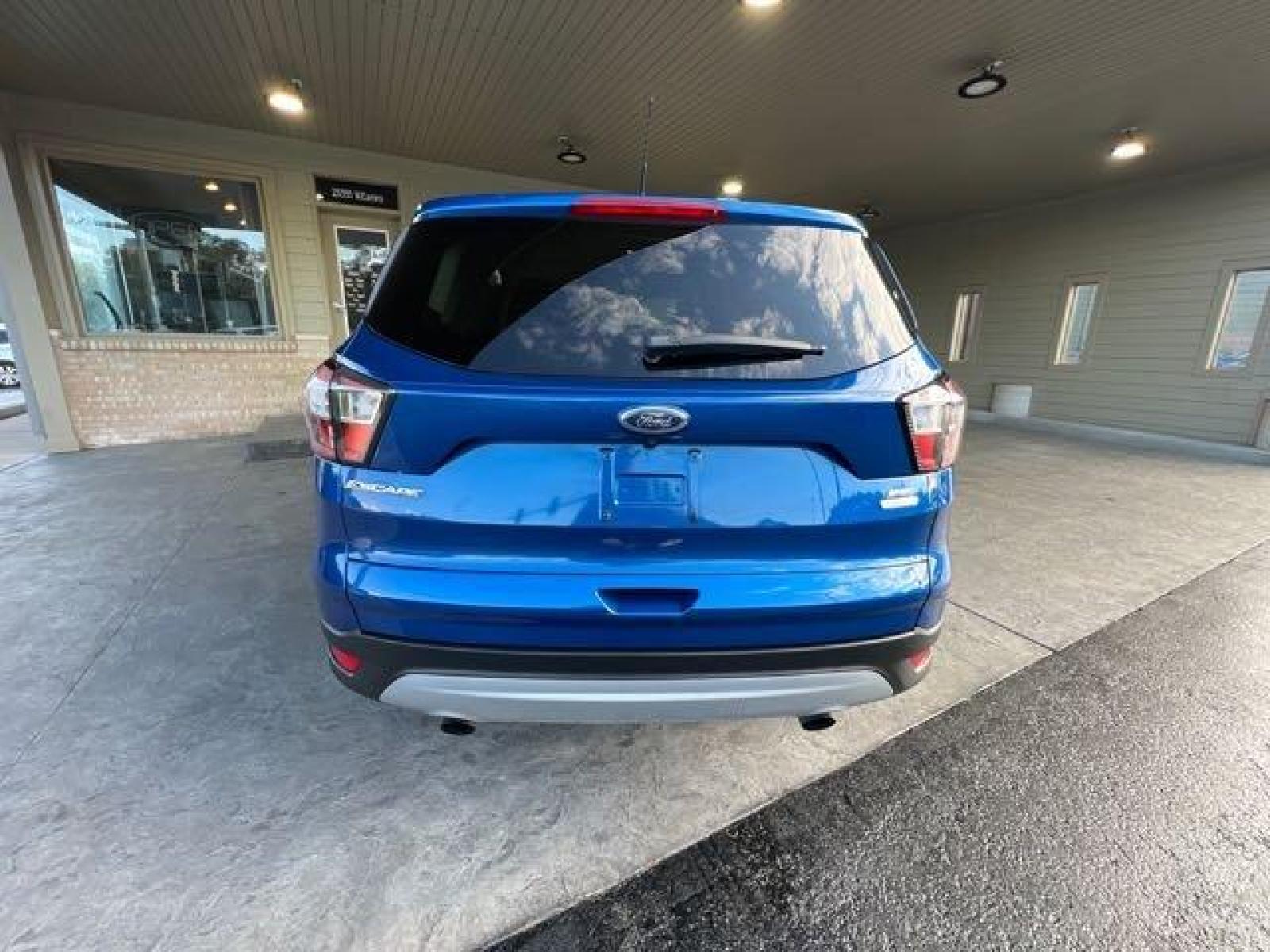 2017 Lightning Blue Ford Escape SE (1FMCU0GD4HU) with an 1.5 engine, Automatic transmission, located at 25355 Eames Street, Channahon, IL, 60410, (815) 467-1807, 41.429108, -88.228432 - CLEAN LOW MILE LOCAL TRADE! BACK UP CAMERA! *CPO 3 MONTH/3,000 MILE WARRANTY INCLUDED* If you're ready for a different, no hassle and pleasant car buying experience, then give us a chance! We're breaking the standard Car Sales mold and making one of our very own you'll be sure to appreciate! So, wh - Photo #5