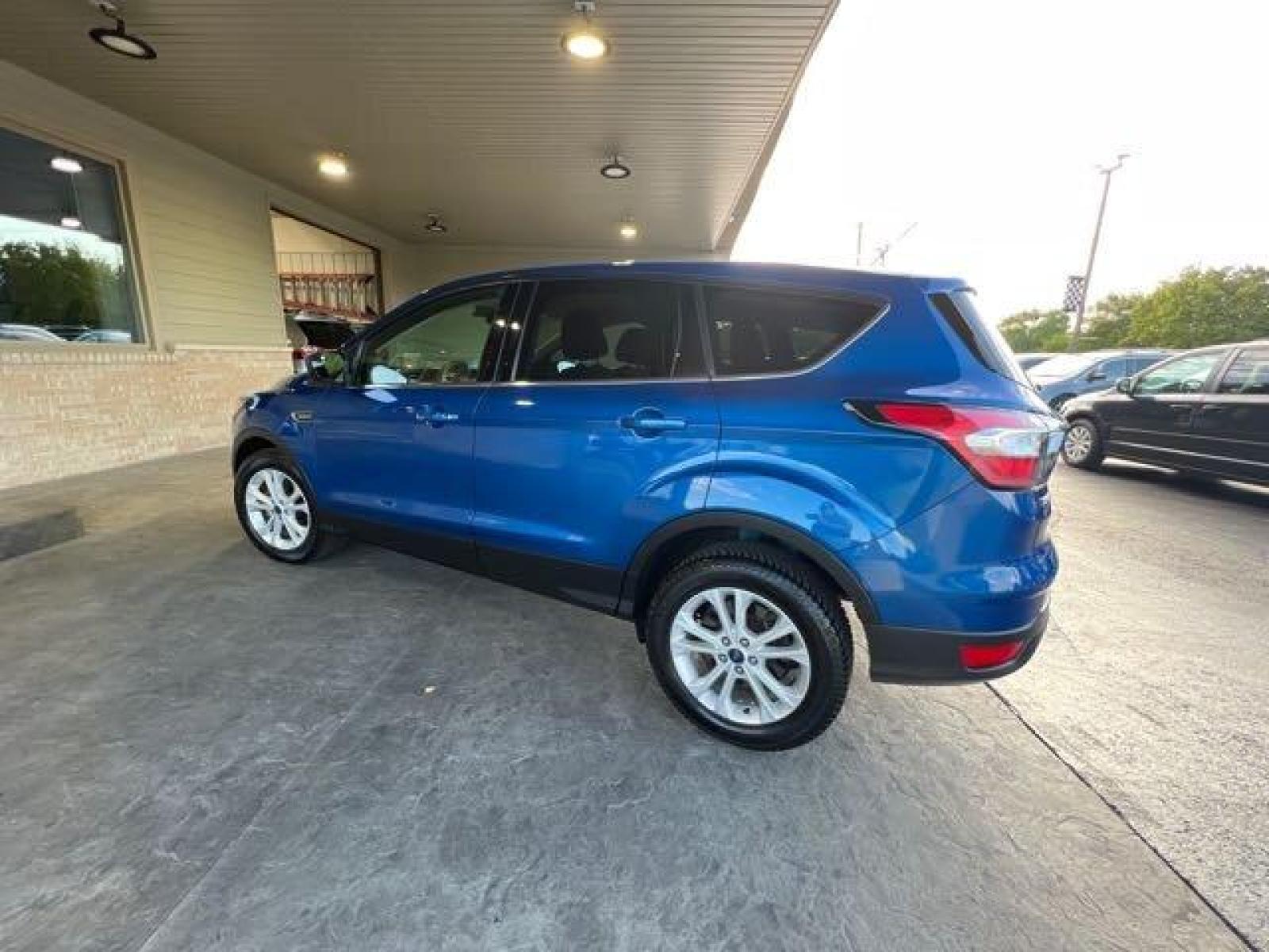 2017 Lightning Blue Ford Escape SE (1FMCU0GD4HU) with an 1.5 engine, Automatic transmission, located at 25355 Eames Street, Channahon, IL, 60410, (815) 467-1807, 41.429108, -88.228432 - CLEAN LOW MILE LOCAL TRADE! BACK UP CAMERA! *CPO 3 MONTH/3,000 MILE WARRANTY INCLUDED* If you're ready for a different, no hassle and pleasant car buying experience, then give us a chance! We're breaking the standard Car Sales mold and making one of our very own you'll be sure to appreciate! So, wh - Photo #7