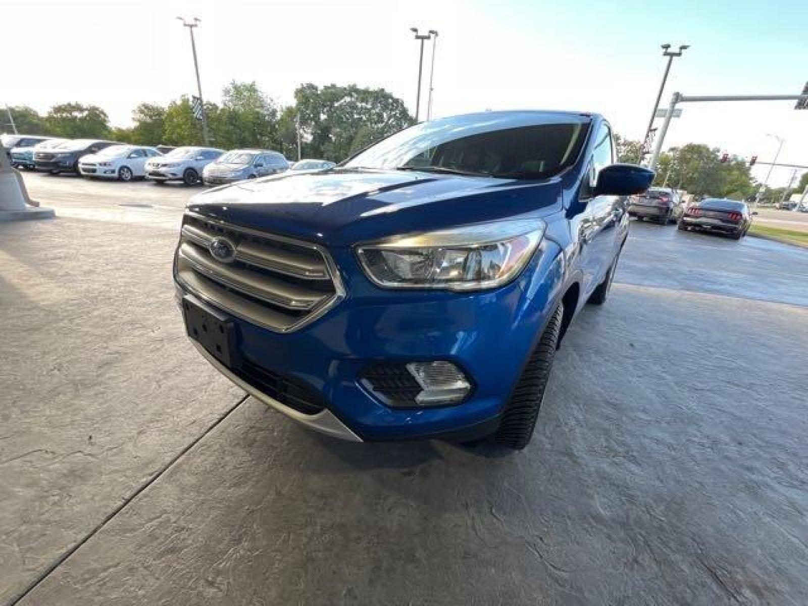 2017 Lightning Blue Ford Escape SE (1FMCU0GD4HU) with an 1.5 engine, Automatic transmission, located at 25355 Eames Street, Channahon, IL, 60410, (815) 467-1807, 41.429108, -88.228432 - CLEAN LOW MILE LOCAL TRADE! BACK UP CAMERA! *CPO 3 MONTH/3,000 MILE WARRANTY INCLUDED* If you're ready for a different, no hassle and pleasant car buying experience, then give us a chance! We're breaking the standard Car Sales mold and making one of our very own you'll be sure to appreciate! So, wh - Photo #8