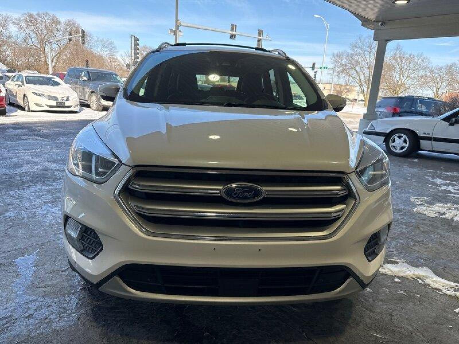 2017 White Platinum Metallic Tri-Coat Ford Escape Titanium (1FMCU9J91HU) with an EcoBoost 2.0L Turbo I4 245hp 275ft. lbs. engine, Automatic transmission, located at 25355 Eames Street, Channahon, IL, 60410, (815) 467-1807, 41.429108, -88.228432 - Looking for a ride that's turbo-charged and ready to go? Look no further than the 2017 Ford Escape Titanium! This baby is powered by an EcoBoost 2.0L Turbo I4 engine that's packing 245 horsepower and 275ft. lbs. of torque. That's right, you'll be flying down the highway with the wind in your hair an - Photo #9