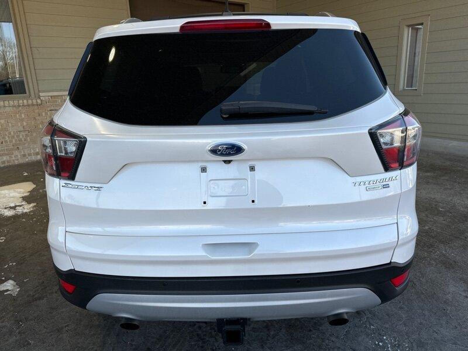 2017 White Platinum Metallic Tri-Coat Ford Escape Titanium (1FMCU9J91HU) with an EcoBoost 2.0L Turbo I4 245hp 275ft. lbs. engine, Automatic transmission, located at 25355 Eames Street, Channahon, IL, 60410, (815) 467-1807, 41.429108, -88.228432 - Looking for a ride that's turbo-charged and ready to go? Look no further than the 2017 Ford Escape Titanium! This baby is powered by an EcoBoost 2.0L Turbo I4 engine that's packing 245 horsepower and 275ft. lbs. of torque. That's right, you'll be flying down the highway with the wind in your hair an - Photo #5