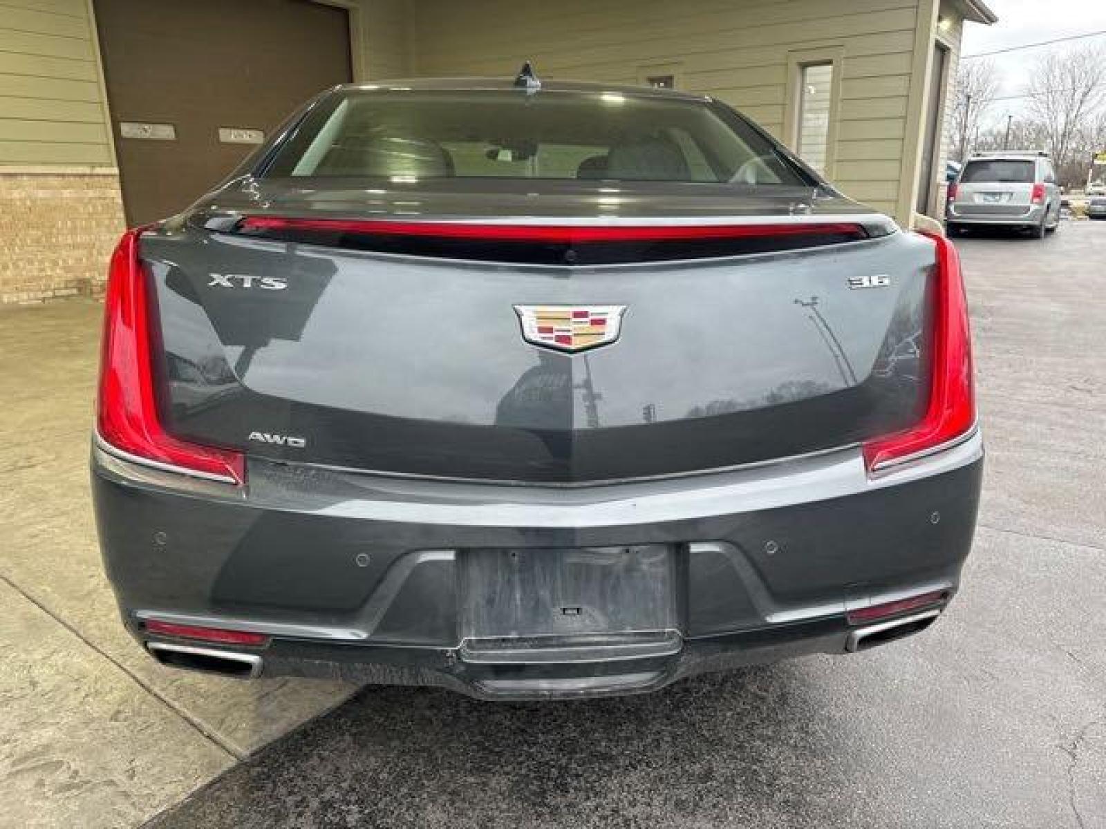 2019 Phantom Gray Metallic Cadillac XTS Luxury (2G61N5S37K9) with an 3.6 engine, Automatic transmission, located at 25355 Eames Street, Channahon, IL, 60410, (815) 467-1807, 41.429108, -88.228432 - Introducing the 2019 Cadillac XTS Luxury AWD, the car that's so luxurious, you'll feel like you're driving on a cloud. And not just any cloud, a cloud made of diamonds. Powered by a 3.6 engine, this baby purrs like a contented kitten. But that's not all, folks! This car comes with more features than - Photo #4