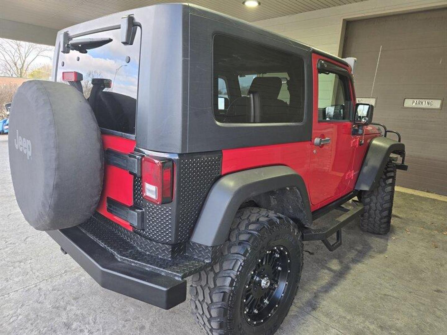 2007 Flame Red Clearcoat Jeep Wrangler Rubicon (1J8GA64197L) with an 3.8L V6 205hp 240ft. lbs. engine, 6 Speed Manual transmission, located at 25355 Eames Street, Channahon, IL, 60410, (815) 467-1807, 41.429108, -88.228432 - Photo#3