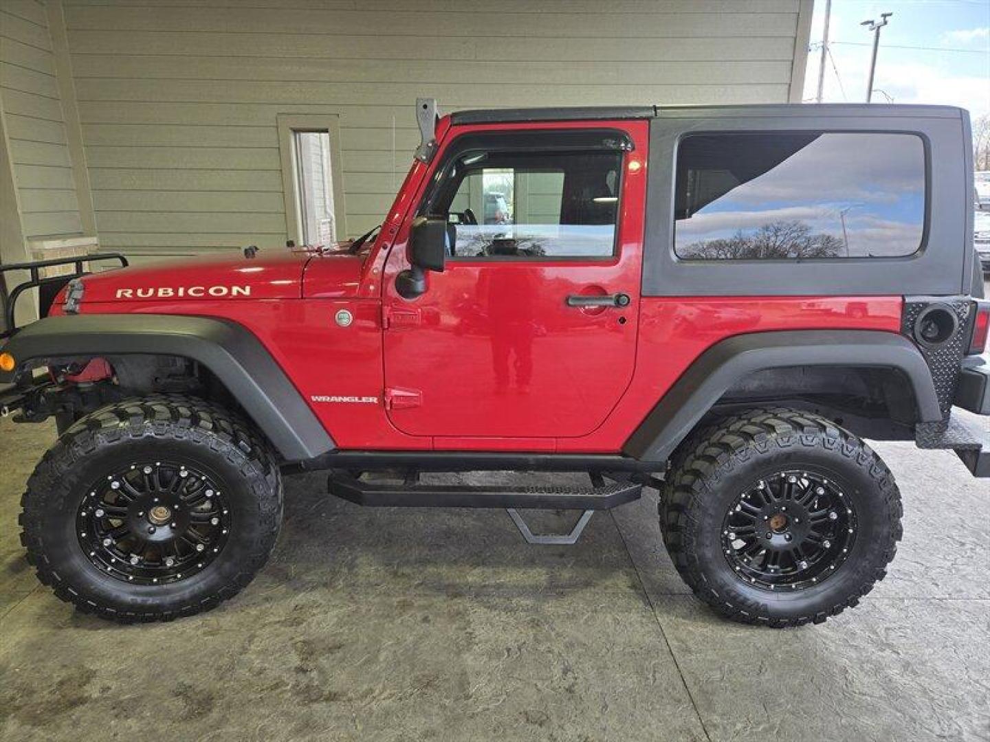 2007 Flame Red Clearcoat Jeep Wrangler Rubicon (1J8GA64197L) with an 3.8L V6 205hp 240ft. lbs. engine, 6 Speed Manual transmission, located at 25355 Eames Street, Channahon, IL, 60410, (815) 467-1807, 41.429108, -88.228432 - Photo#7