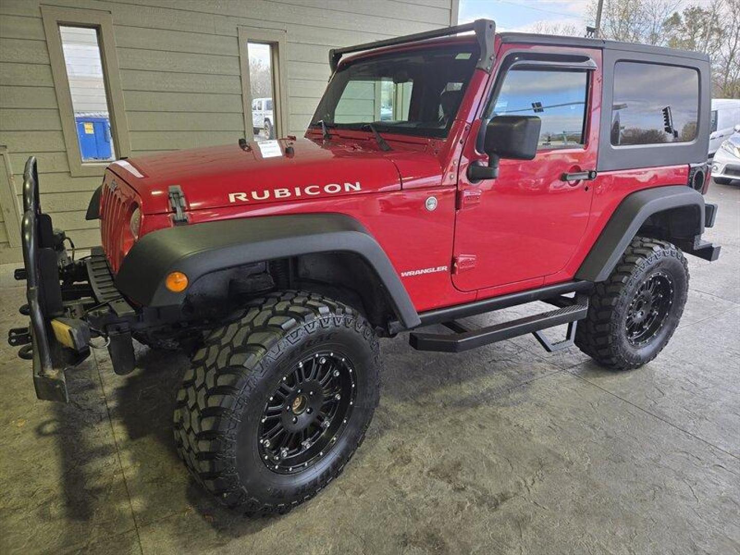 2007 Flame Red Clearcoat Jeep Wrangler Rubicon (1J8GA64197L) with an 3.8L V6 205hp 240ft. lbs. engine, 6 Speed Manual transmission, located at 25355 Eames Street, Channahon, IL, 60410, (815) 467-1807, 41.429108, -88.228432 - Photo#8
