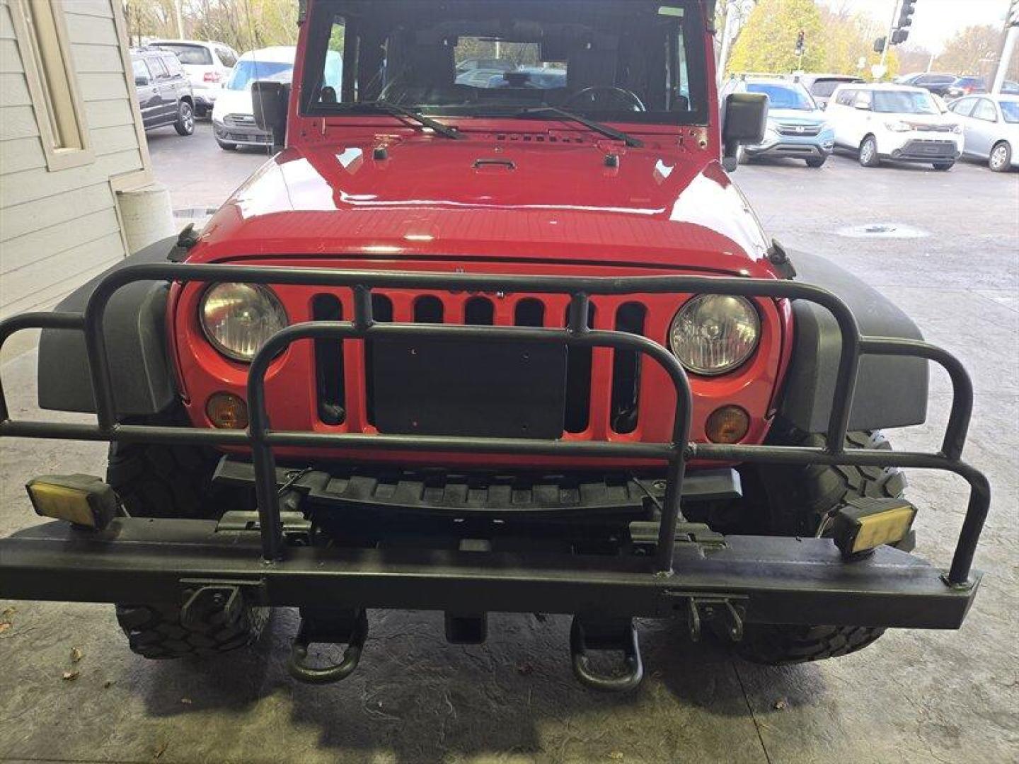 2007 Flame Red Clearcoat Jeep Wrangler Rubicon (1J8GA64197L) with an 3.8L V6 205hp 240ft. lbs. engine, 6 Speed Manual transmission, located at 25355 Eames Street, Channahon, IL, 60410, (815) 467-1807, 41.429108, -88.228432 - Photo#9