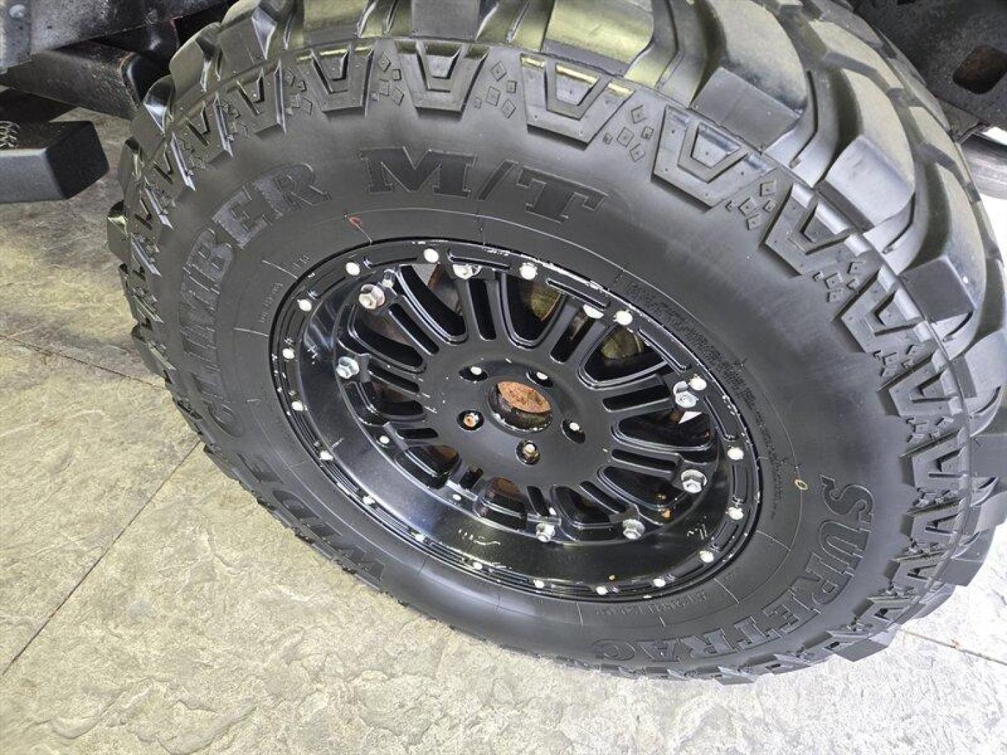 2007 Flame Red Clearcoat Jeep Wrangler Rubicon (1J8GA64197L) with an 3.8L V6 205hp 240ft. lbs. engine, 6 Speed Manual transmission, located at 25355 Eames Street, Channahon, IL, 60410, (815) 467-1807, 41.429108, -88.228432 - Photo#19
