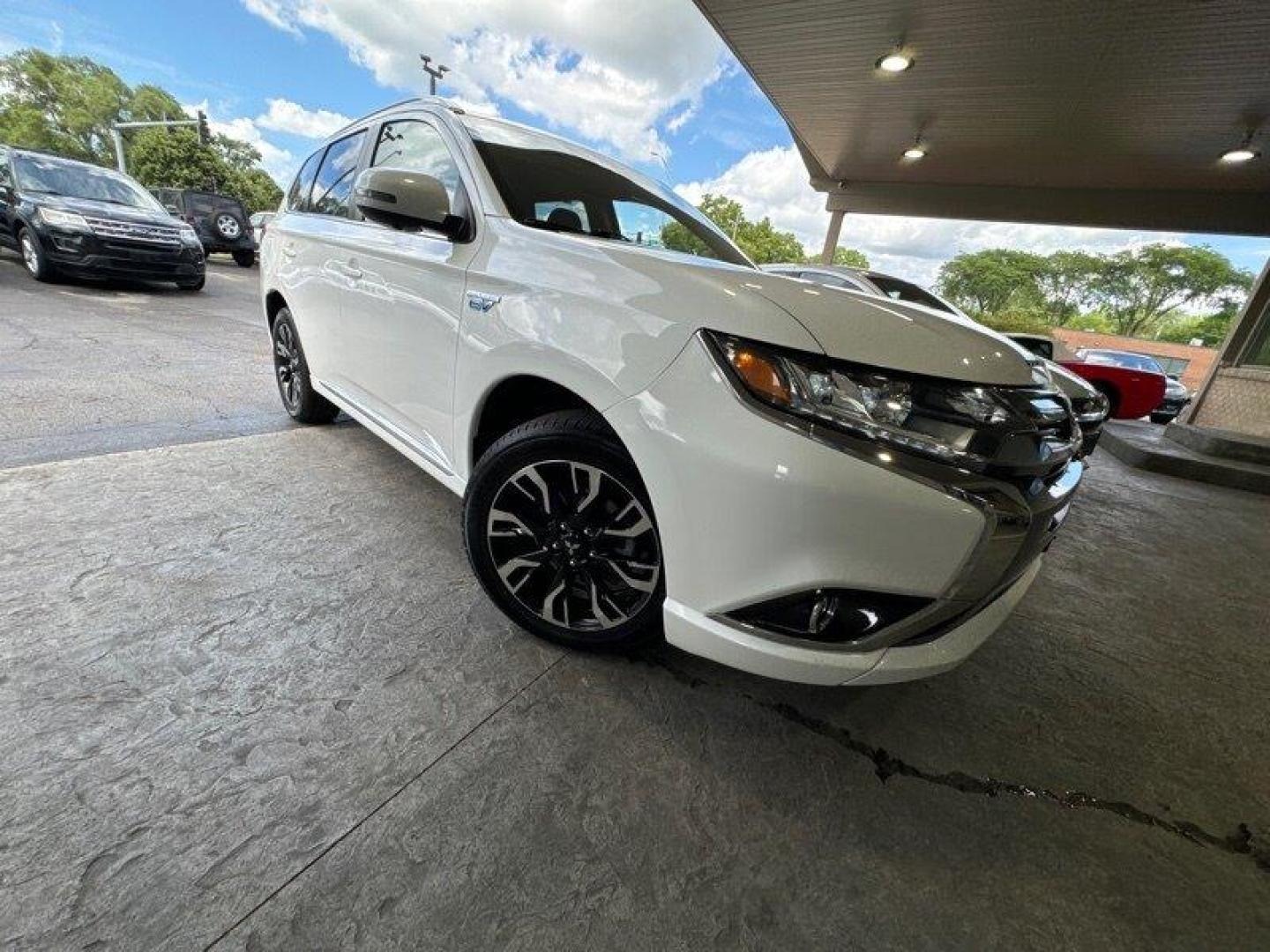 2018 Diamond White Pearl Mitsubishi Outlander PHEV GT (JA4J24A57JZ) with an 2.0L Plug-in Hybrid I4 117hp engine, Automatic transmission, located at 25355 Eames Street, Channahon, IL, 60410, (815) 467-1807, 41.429108, -88.228432 - Introducing the 2018 Mitsubishi Outlander PHEV GT - a sleek and powerful plug-in hybrid SUV that's ready to dominate the road! Powered by a 2.0L Plug-in Hybrid I4 117hp engine, this beast offers an unbeatable combination of performance and fuel efficiency. As soon as you lay eyes on the Diamond Whi - Photo#0