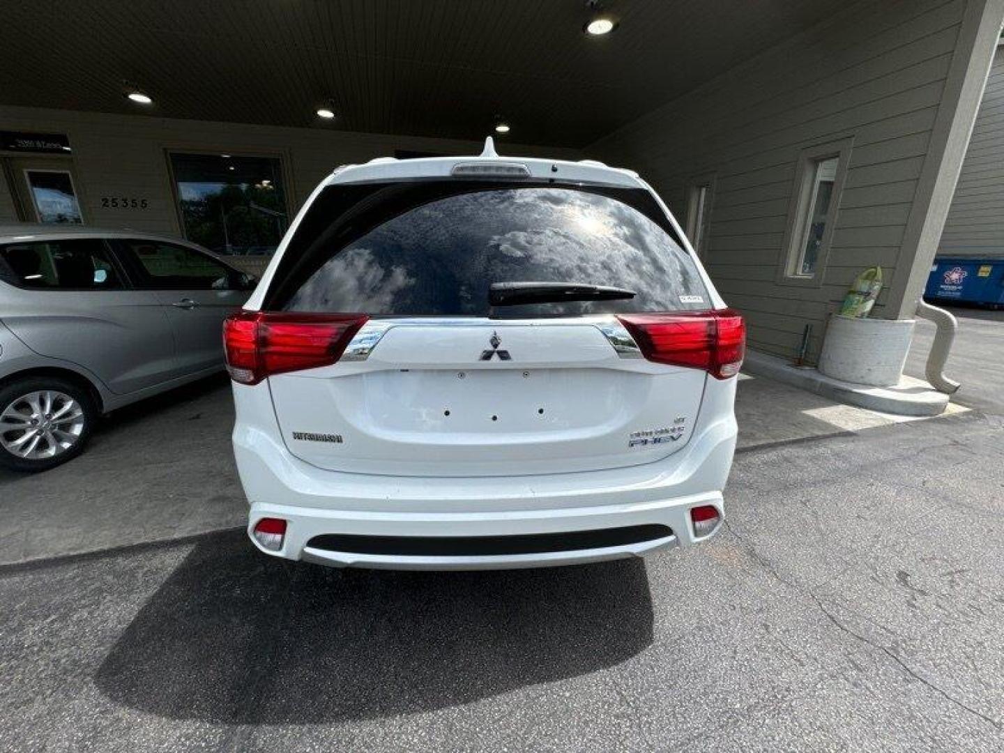 2018 Diamond White Pearl Mitsubishi Outlander PHEV GT (JA4J24A57JZ) with an 2.0L Plug-in Hybrid I4 117hp engine, Automatic transmission, located at 25355 Eames Street, Channahon, IL, 60410, (815) 467-1807, 41.429108, -88.228432 - Introducing the 2018 Mitsubishi Outlander PHEV GT - a sleek and powerful plug-in hybrid SUV that's ready to dominate the road! Powered by a 2.0L Plug-in Hybrid I4 117hp engine, this beast offers an unbeatable combination of performance and fuel efficiency. As soon as you lay eyes on the Diamond Whi - Photo#4
