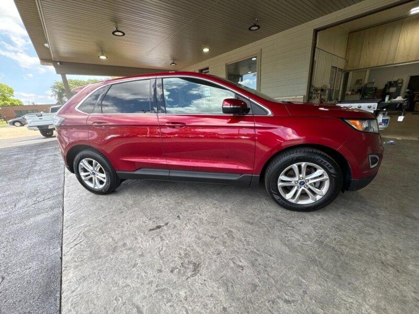 2015 Bronze Fire Metallic Tinted Clearcoat Ford Edge SEL (2FMTK3J85FB) with an 3.5L V6 280hp 250ft. lbs. engine, Automatic transmission, located at 25355 Eames Street, Channahon, IL, 60410, (815) 467-1807, 41.429108, -88.228432 - Behold the magnificent 2015 Ford Edge SEL, a true masterpiece of engineering and design! With a commanding 3.5L V6 engine that churns out a jaw-dropping 280 horsepower and 250 foot-pounds of torque, this vehicle delivers a driving experience unlike any other. Step inside this work of art and marve - Photo#1