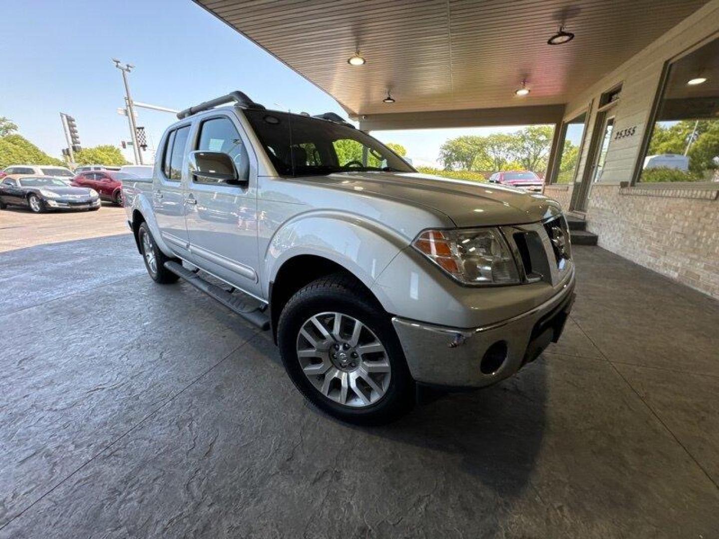 2012 Brilliant Silver Nissan Frontier SL (1N6AD0EV2CC) with an 4.0L V6 261hp 281ft. lbs. engine, Automatic transmission, located at 25355 Eames Street, Channahon, IL, 60410, (815) 467-1807, 41.429108, -88.228432 - Photo#0