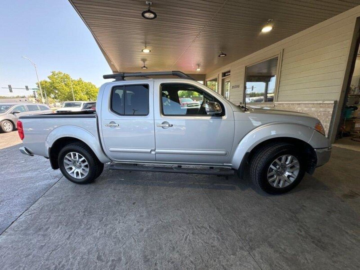 2012 Brilliant Silver Nissan Frontier SL (1N6AD0EV2CC) with an 4.0L V6 261hp 281ft. lbs. engine, Automatic transmission, located at 25355 Eames Street, Channahon, IL, 60410, (815) 467-1807, 41.429108, -88.228432 - Photo#2