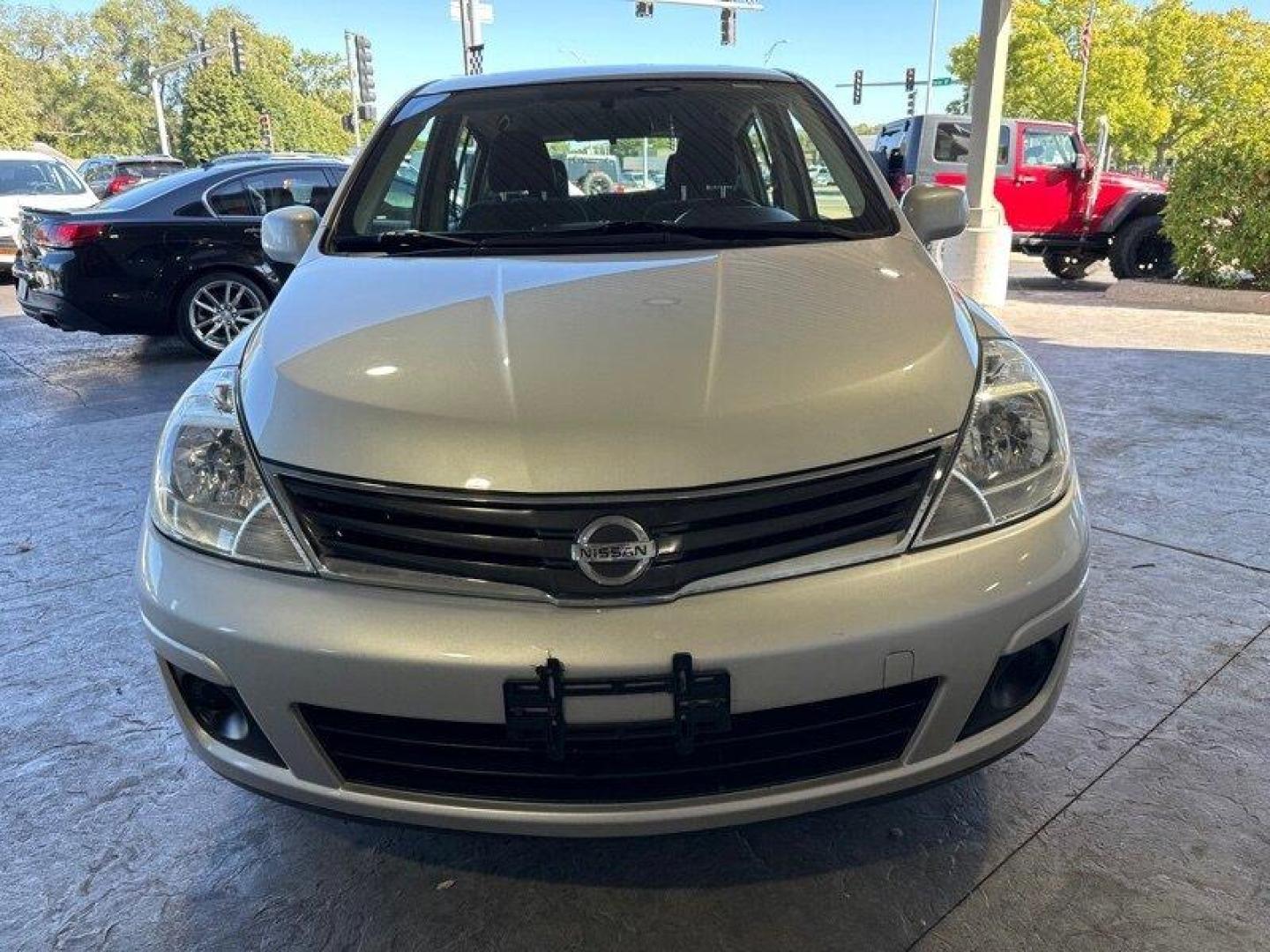 2012 Brilliant Silver Nissan Versa 1.8 S (3N1BC1CP2CK) with an 1.8L I4 122hp 127ft. lbs. engine, Automatic transmission, located at 25355 Eames Street, Channahon, IL, 60410, (815) 467-1807, 41.429108, -88.228432 - Photo#9