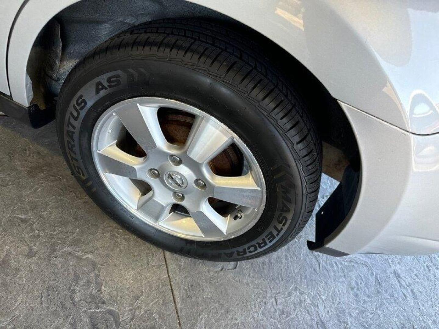 2012 Brilliant Silver Nissan Versa 1.8 S (3N1BC1CP2CK) with an 1.8L I4 122hp 127ft. lbs. engine, Automatic transmission, located at 25355 Eames Street, Channahon, IL, 60410, (815) 467-1807, 41.429108, -88.228432 - Photo#12