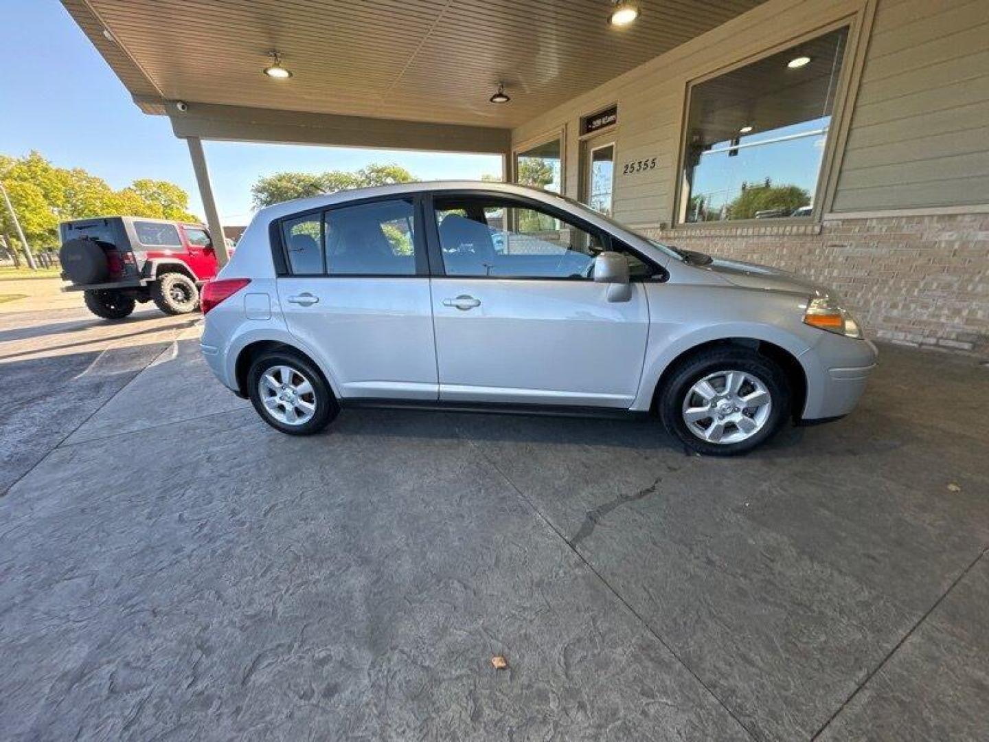 2012 Brilliant Silver Nissan Versa 1.8 S (3N1BC1CP2CK) with an 1.8L I4 122hp 127ft. lbs. engine, Automatic transmission, located at 25355 Eames Street, Channahon, IL, 60410, (815) 467-1807, 41.429108, -88.228432 - Photo#2