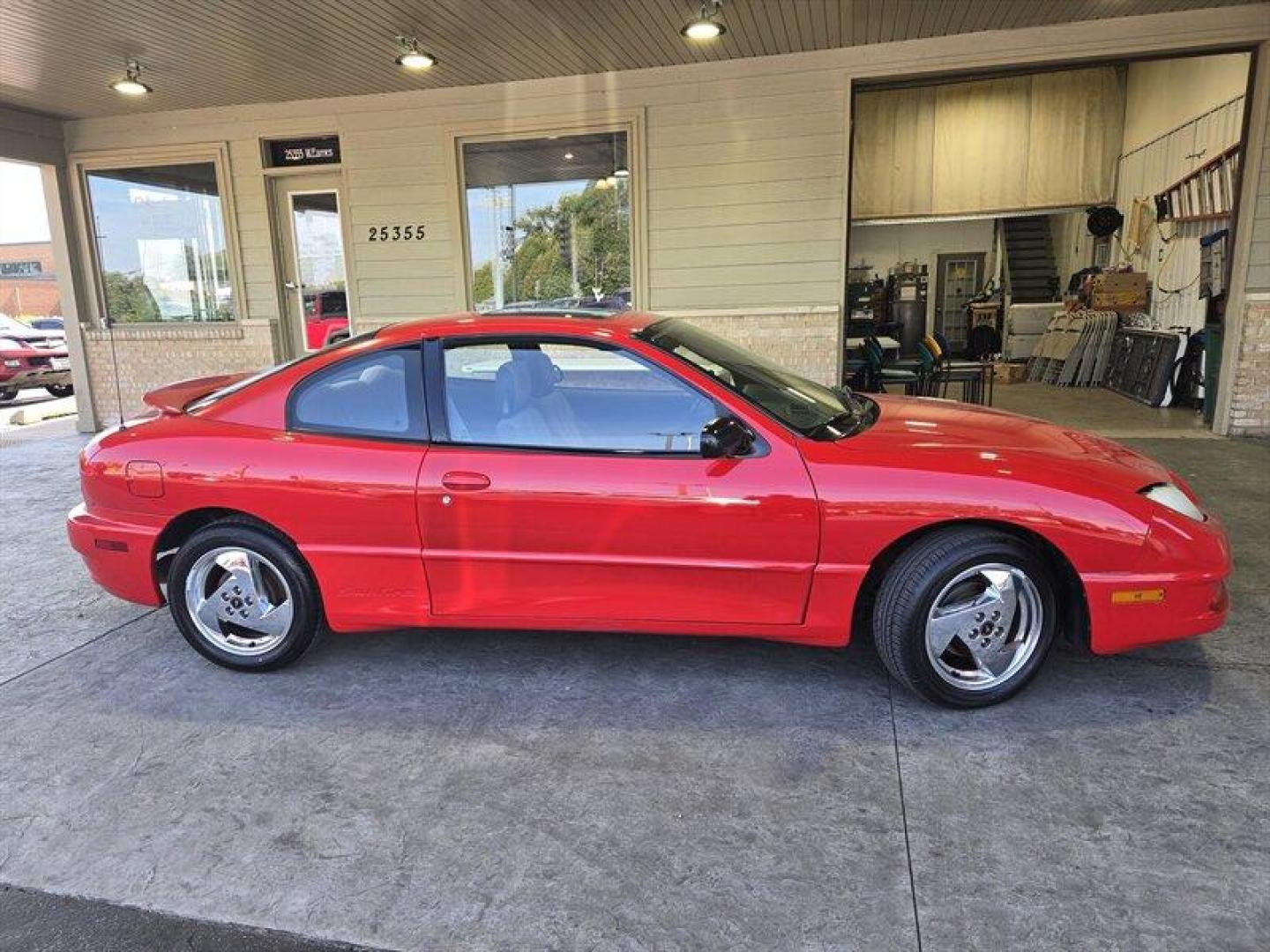 2005 Sport Red Metallic Pontiac Sunfire (3G2JB12F25S) with an 2.2L I4 140 hp 150ft. lbs. DOHC 16V engine, Automatic transmission, located at 25355 Eames Street, Channahon, IL, 60410, (815) 467-1807, 41.429108, -88.228432 - Photo#1