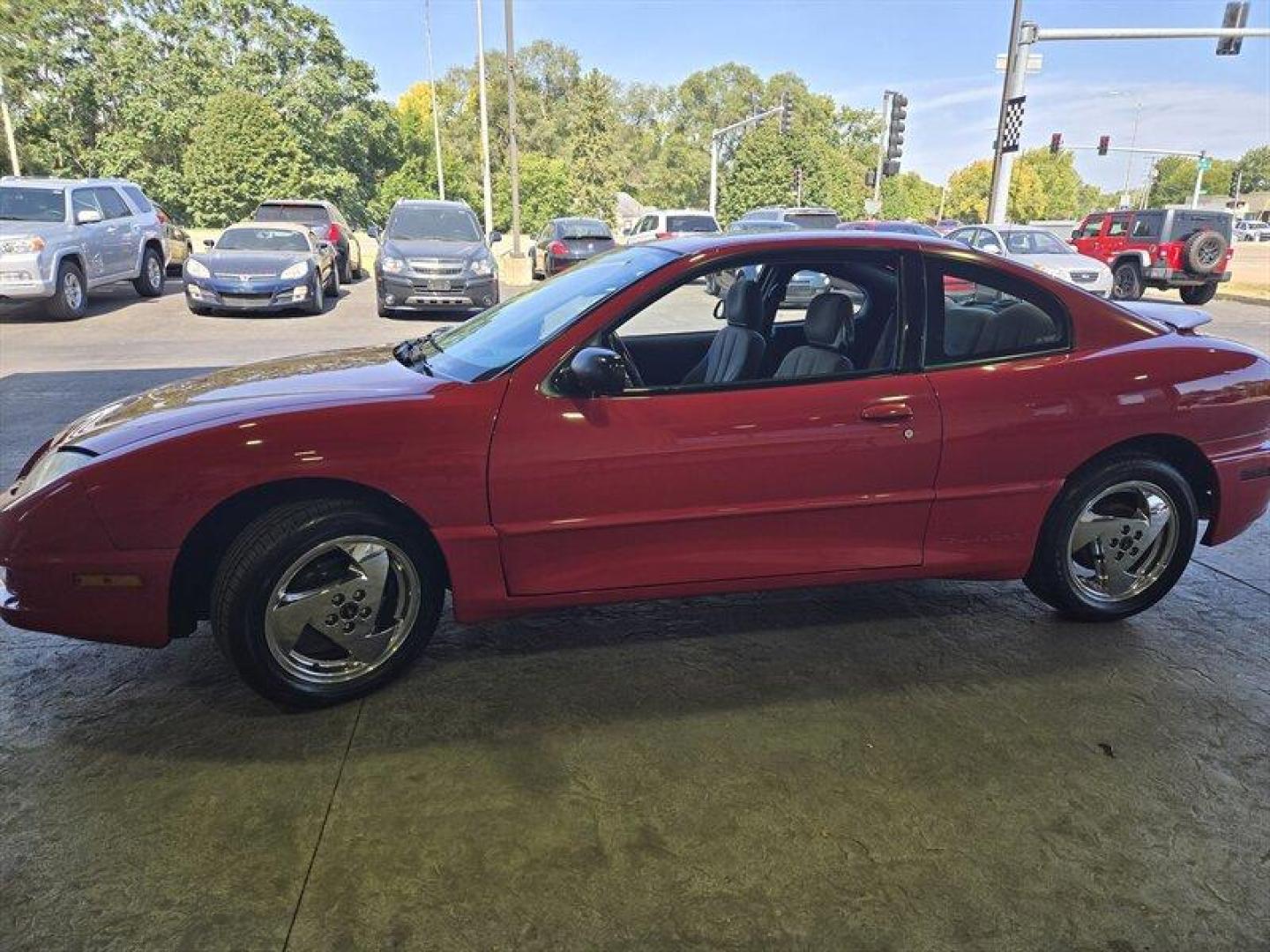 2005 Sport Red Metallic Pontiac Sunfire (3G2JB12F25S) with an 2.2L I4 140 hp 150ft. lbs. DOHC 16V engine, Automatic transmission, located at 25355 Eames Street, Channahon, IL, 60410, (815) 467-1807, 41.429108, -88.228432 - Photo#7
