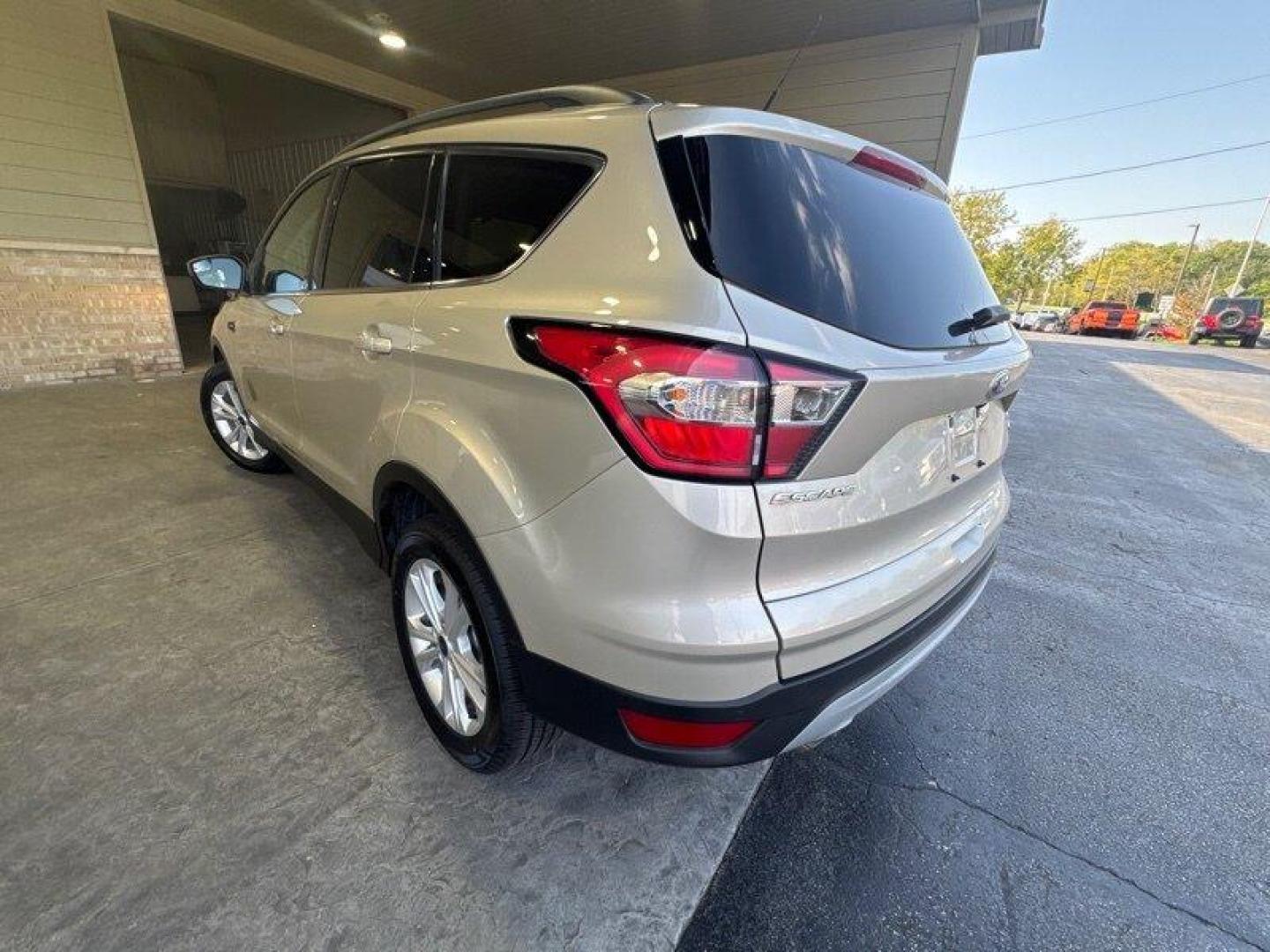 2018 White Gold Ford Escape SEL (1FMCU0HD0JU) with an EcoBoost 1.5L Turbo I4 179hp 177ft. lbs. engine, Automatic transmission, located at 25355 Eames Street, Channahon, IL, 60410, (815) 467-1807, 41.429108, -88.228432 - Looking for a compact SUV that delivers both style and performance? Look no further than the 2018 Ford Escape SEL! With a powerful EcoBoost 1.5L Turbo I4 engine that produces 179 horsepower and 177 ft. lbs. of torque, this vehicle is sure to impress. But that's not all the 2018 Ford Escape SEL als - Photo#6