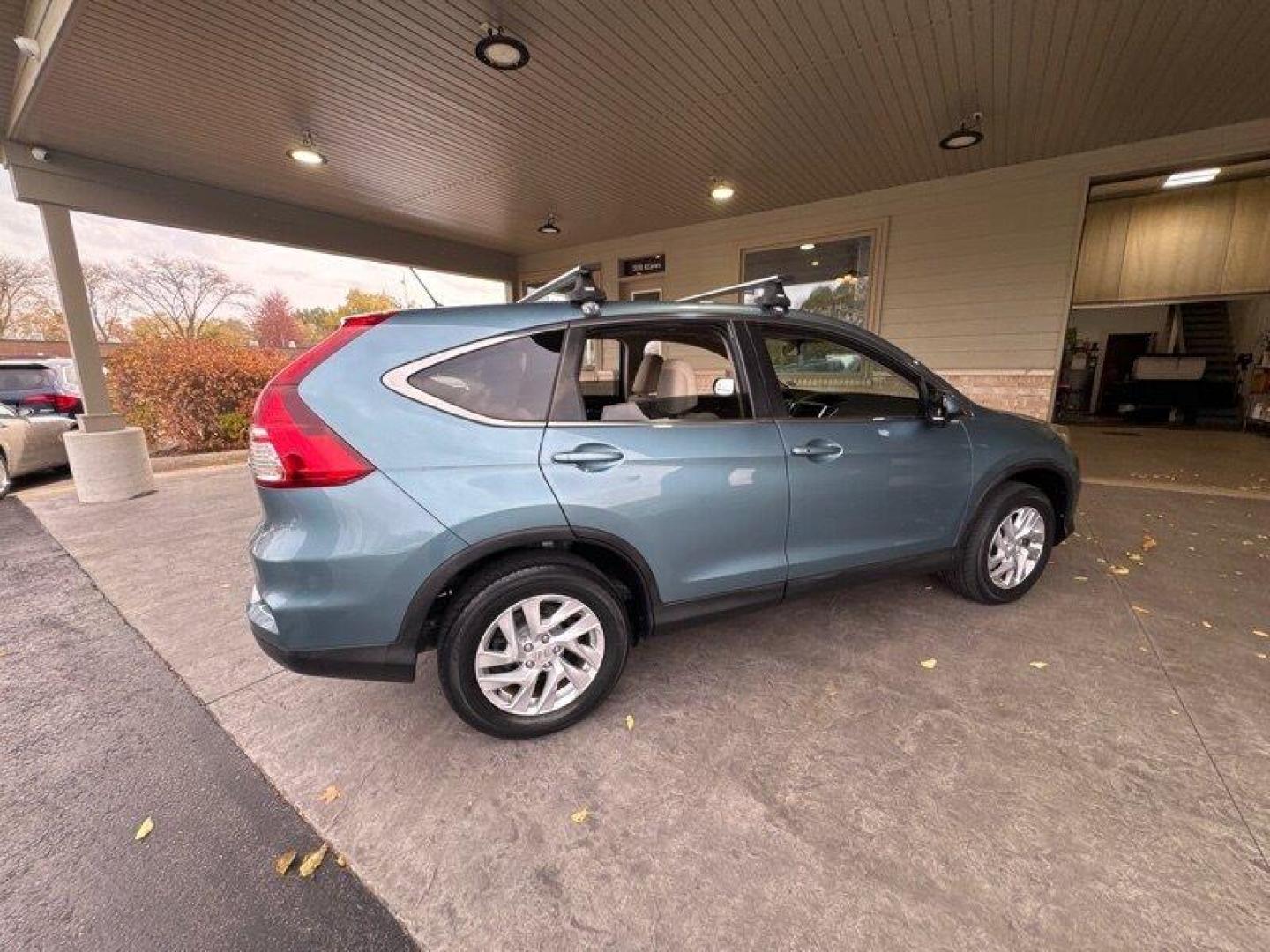 2016 Obsidian Blue Pearl Honda CR-V EX (5J6RM4H54GL) with an 2.4L I4 185hp 181ft. lbs. engine, Automatic transmission, located at 25355 Eames Street, Channahon, IL, 60410, (815) 467-1807, 41.429108, -88.228432 - Oh, baby, have you seen our 2016 Honda CR-V EX in Obsidian Blue Pearl with Beige interior? It's a real head-turner! Let me tell you all about its factory default features. Under the hood, you've got a powerful 2.4L I4 185hp 181ft. lbs. engine that'll have you zooming down the highway like a boss. - Photo#2