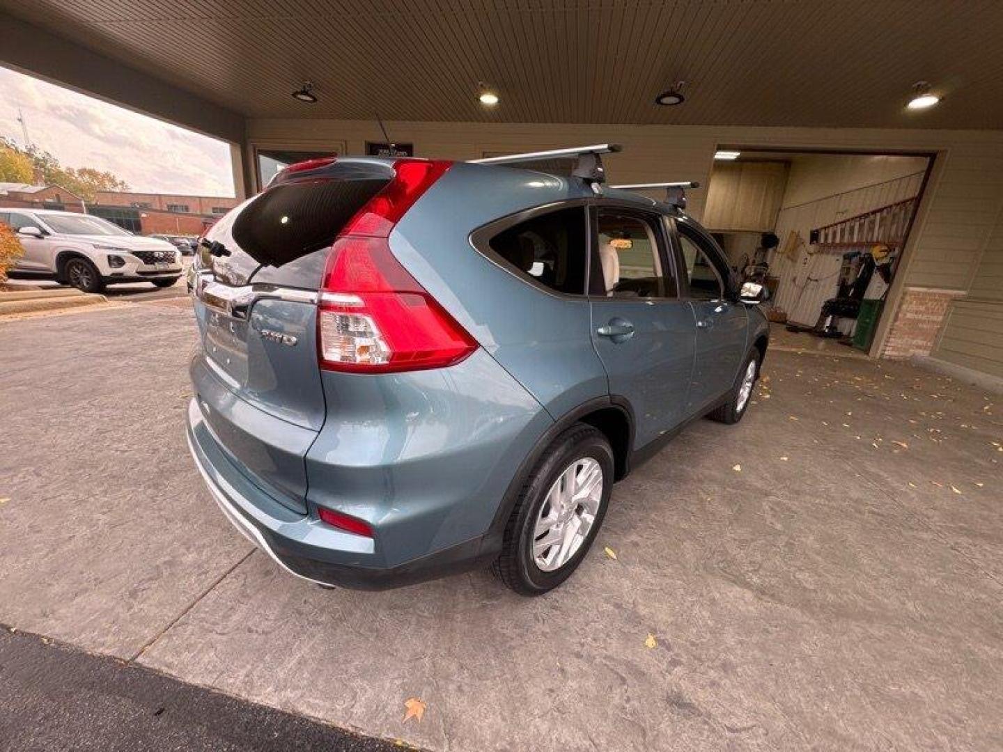 2016 Obsidian Blue Pearl Honda CR-V EX (5J6RM4H54GL) with an 2.4L I4 185hp 181ft. lbs. engine, Automatic transmission, located at 25355 Eames Street, Channahon, IL, 60410, (815) 467-1807, 41.429108, -88.228432 - Oh, baby, have you seen our 2016 Honda CR-V EX in Obsidian Blue Pearl with Beige interior? It's a real head-turner! Let me tell you all about its factory default features. Under the hood, you've got a powerful 2.4L I4 185hp 181ft. lbs. engine that'll have you zooming down the highway like a boss. - Photo#4