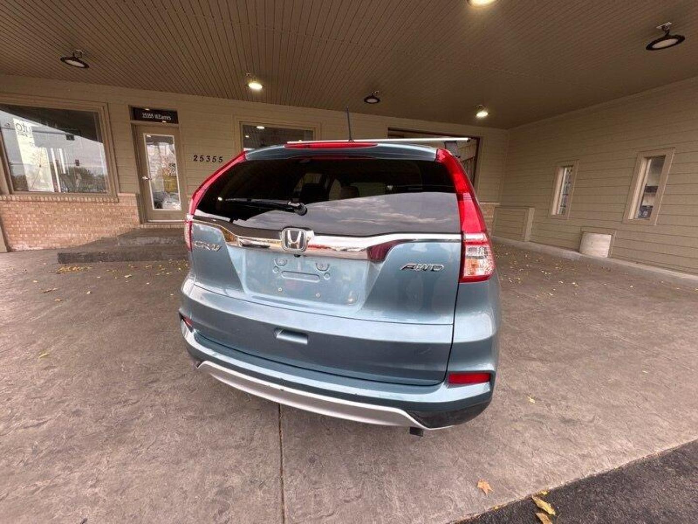 2016 Obsidian Blue Pearl Honda CR-V EX (5J6RM4H54GL) with an 2.4L I4 185hp 181ft. lbs. engine, Automatic transmission, located at 25355 Eames Street, Channahon, IL, 60410, (815) 467-1807, 41.429108, -88.228432 - Oh, baby, have you seen our 2016 Honda CR-V EX in Obsidian Blue Pearl with Beige interior? It's a real head-turner! Let me tell you all about its factory default features. Under the hood, you've got a powerful 2.4L I4 185hp 181ft. lbs. engine that'll have you zooming down the highway like a boss. - Photo#5