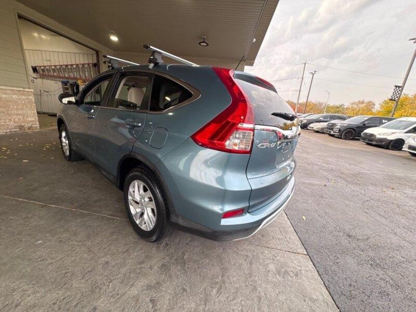 2016 Obsidian Blue Pearl Honda CR-V EX (5J6RM4H54GL) with an 2.4L I4 185hp 181ft. lbs. engine, Automatic transmission, located at 25355 Eames Street, Channahon, IL, 60410, (815) 467-1807, 41.429108, -88.228432 - Oh, baby, have you seen our 2016 Honda CR-V EX in Obsidian Blue Pearl with Beige interior? It's a real head-turner! Let me tell you all about its factory default features. Under the hood, you've got a powerful 2.4L I4 185hp 181ft. lbs. engine that'll have you zooming down the highway like a boss. - Photo#6