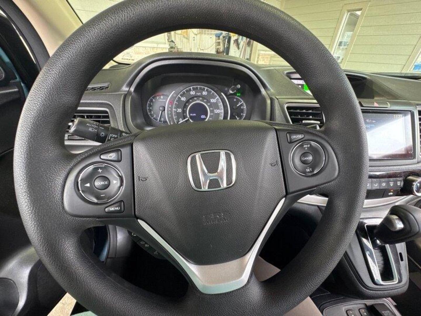 2016 Obsidian Blue Pearl Honda CR-V EX (5J6RM4H54GL) with an 2.4L I4 185hp 181ft. lbs. engine, Automatic transmission, located at 25355 Eames Street, Channahon, IL, 60410, (815) 467-1807, 41.429108, -88.228432 - Oh, baby, have you seen our 2016 Honda CR-V EX in Obsidian Blue Pearl with Beige interior? It's a real head-turner! Let me tell you all about its factory default features. Under the hood, you've got a powerful 2.4L I4 185hp 181ft. lbs. engine that'll have you zooming down the highway like a boss. - Photo#26