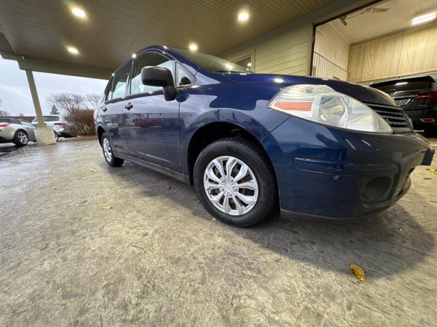 2009 Blue Onyx Nissan Versa 1.6 (3N1CC11EX9L) with an 1.6L I4 107hp 111ft. lbs. engine, Automatic transmission, located at 25355 Eames Street, Channahon, IL, 60410, (815) 467-1807, 41.429108, -88.228432 - Photo#0