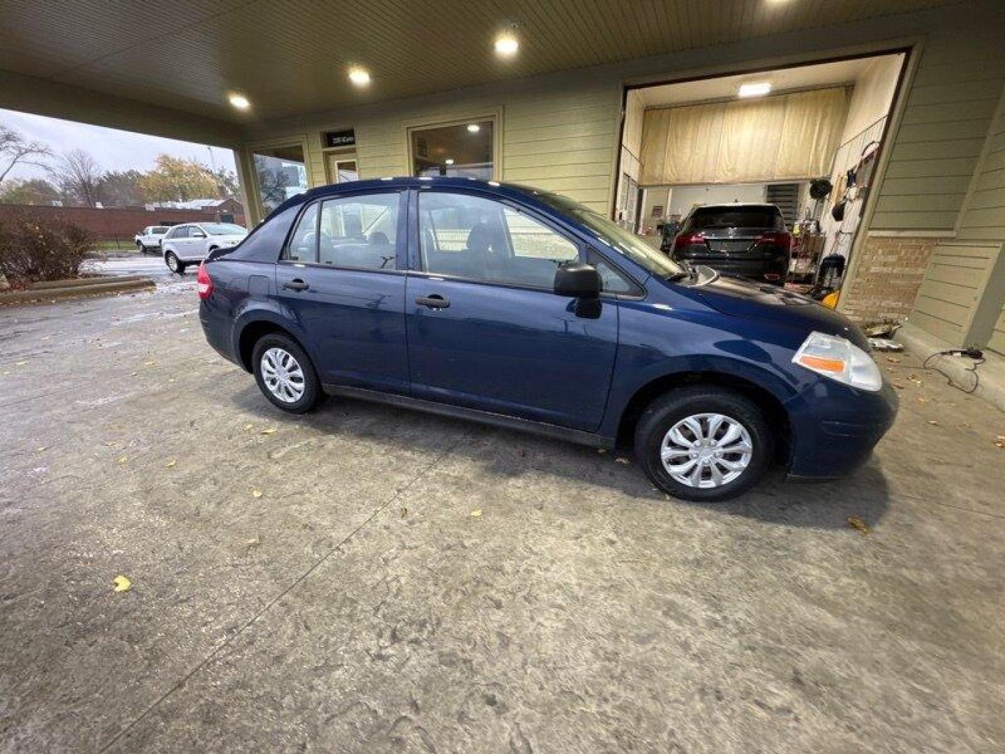 2009 Blue Onyx Nissan Versa 1.6 (3N1CC11EX9L) with an 1.6L I4 107hp 111ft. lbs. engine, Automatic transmission, located at 25355 Eames Street, Channahon, IL, 60410, (815) 467-1807, 41.429108, -88.228432 - Photo#1