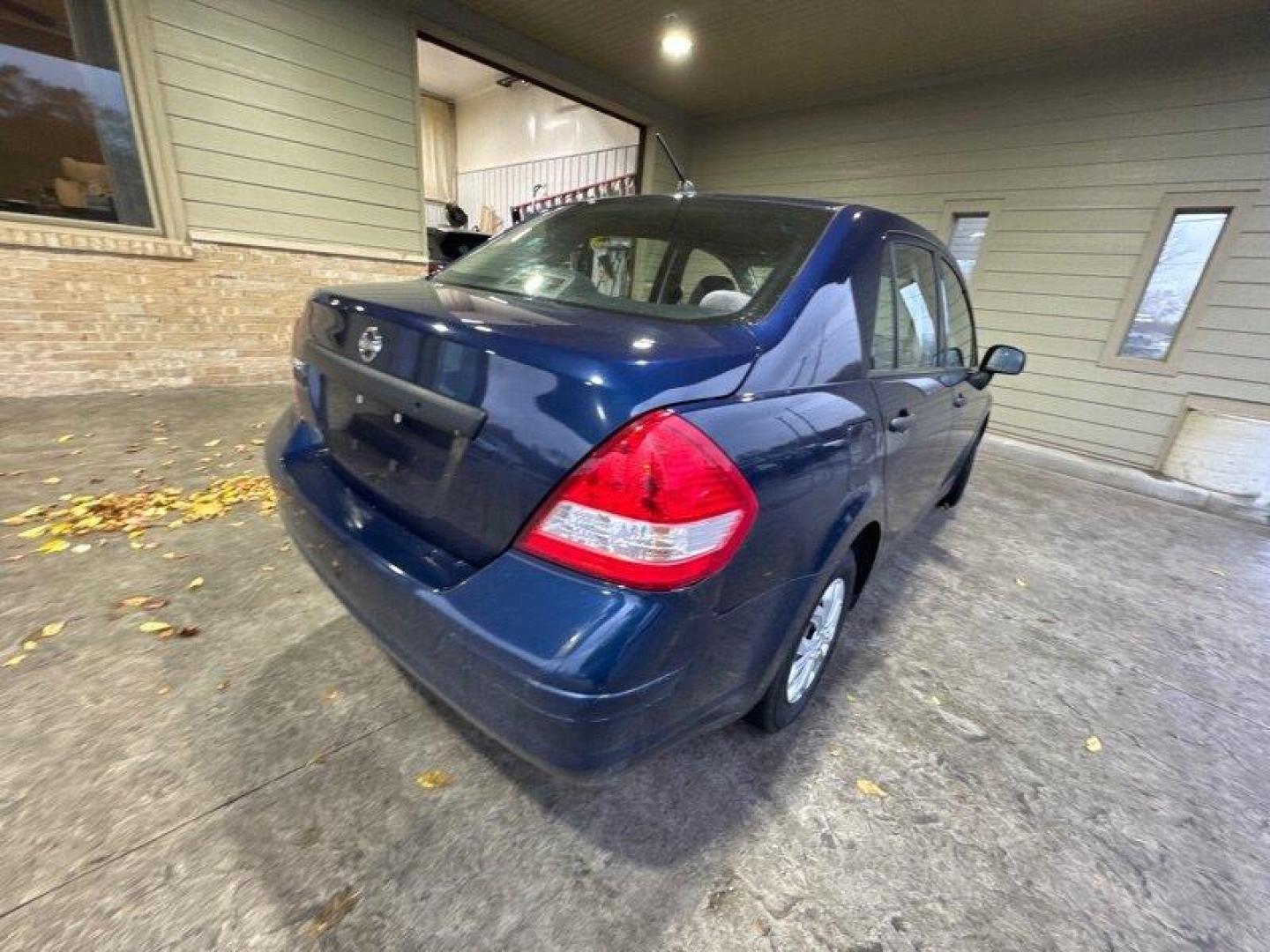 2009 Blue Onyx Nissan Versa 1.6 (3N1CC11EX9L) with an 1.6L I4 107hp 111ft. lbs. engine, Automatic transmission, located at 25355 Eames Street, Channahon, IL, 60410, (815) 467-1807, 41.429108, -88.228432 - Photo#3