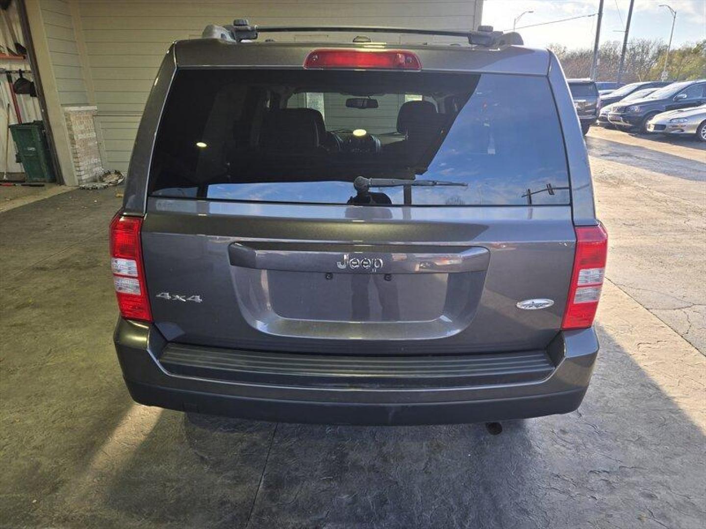 2015 Granite Crystal Metallic Clear Coat Jeep Patriot High Altitude (1C4NJRFB7FD) with an 2.4L I4 172hp 165ft. lbs. engine, Automatic transmission, located at 25355 Eames Street, Channahon, IL, 60410, (815) 467-1807, 41.429108, -88.228432 - Photo#4