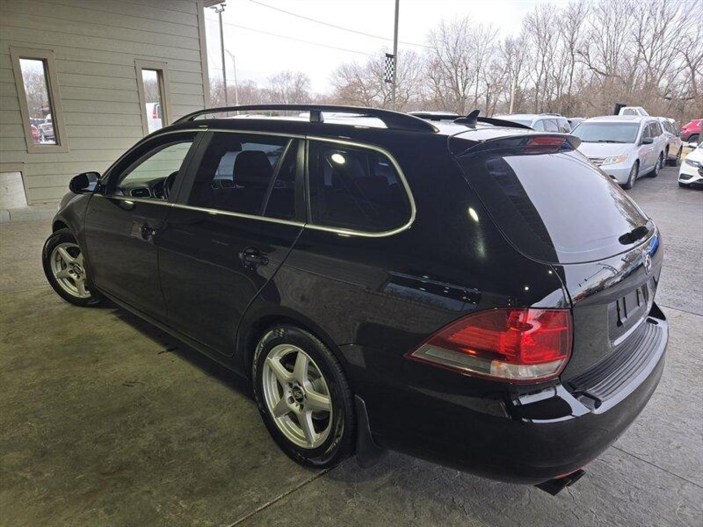 2014 Black Uni Volkswagen Jetta 2.0L TDI (3VWML7AJ4EM) with an 2.0L Diesel Turbo I4 140hp 236ft. lbs. engine, 6 Speed Manual transmission, located at 25355 Eames Street, Channahon, IL, 60410, (815) 467-1807, 41.429108, -88.228432 - Looking for a car that can tackle the daily grind without constantly stopping for gas? Look no further than the 2014 Volkswagen Jetta SportWagen TDI! With a powerful 2.0L Diesel Turbo I4 engine that cranks out 140 horses and 236 ft. lbs. of torque, you'll have all the power you need to zip through t - Photo#5