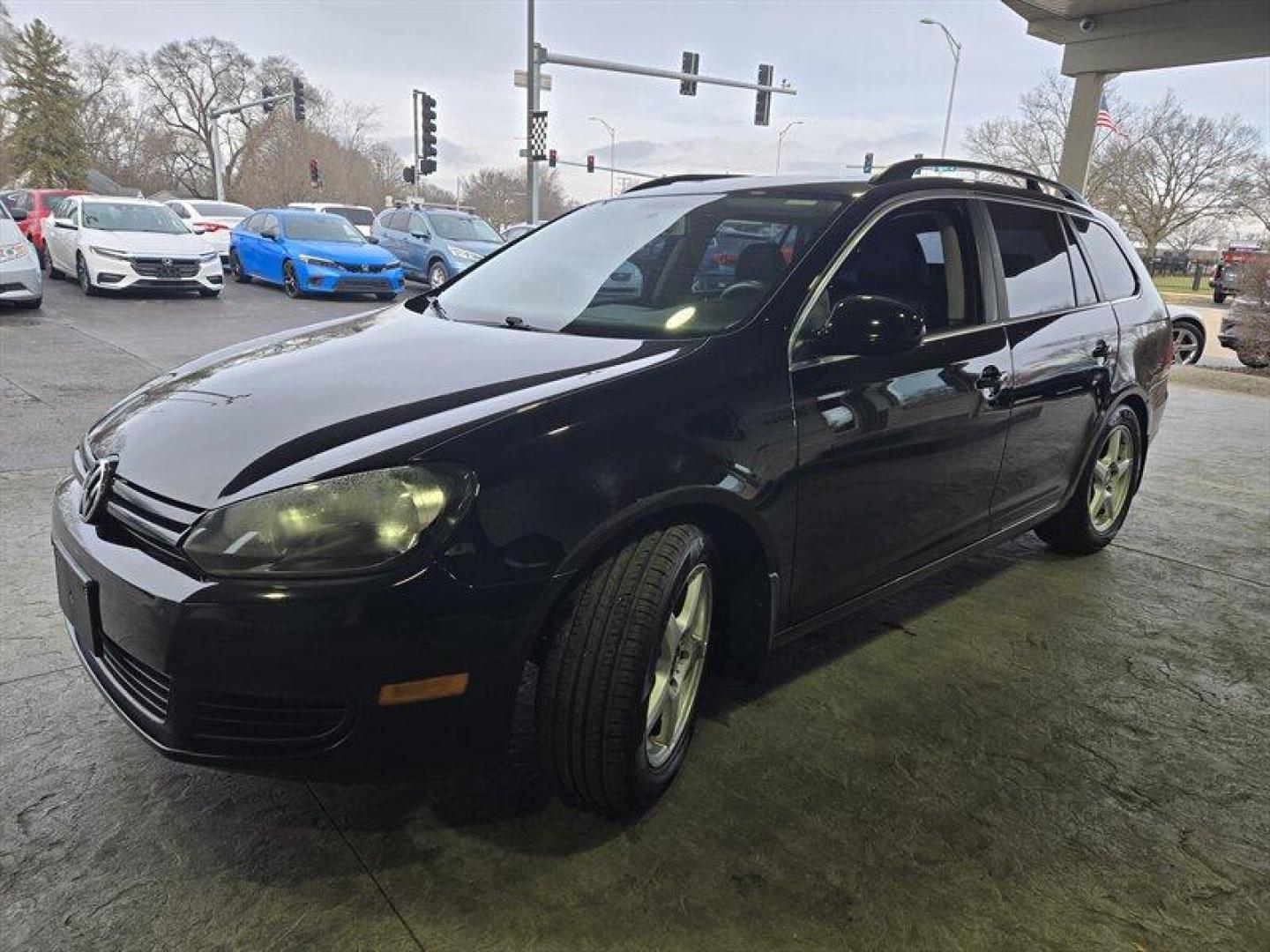 2014 Black Uni Volkswagen Jetta 2.0L TDI (3VWML7AJ4EM) with an 2.0L Diesel Turbo I4 140hp 236ft. lbs. engine, 6 Speed Manual transmission, located at 25355 Eames Street, Channahon, IL, 60410, (815) 467-1807, 41.429108, -88.228432 - Looking for a car that can tackle the daily grind without constantly stopping for gas? Look no further than the 2014 Volkswagen Jetta SportWagen TDI! With a powerful 2.0L Diesel Turbo I4 engine that cranks out 140 horses and 236 ft. lbs. of torque, you'll have all the power you need to zip through t - Photo#7