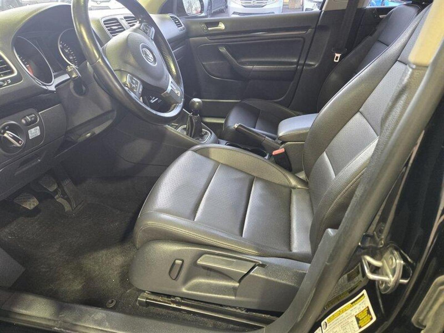 2014 Black Uni Volkswagen Jetta 2.0L TDI (3VWML7AJ4EM) with an 2.0L Diesel Turbo I4 140hp 236ft. lbs. engine, 6 Speed Manual transmission, located at 25355 Eames Street, Channahon, IL, 60410, (815) 467-1807, 41.429108, -88.228432 - Looking for a car that can tackle the daily grind without constantly stopping for gas? Look no further than the 2014 Volkswagen Jetta SportWagen TDI! With a powerful 2.0L Diesel Turbo I4 engine that cranks out 140 horses and 236 ft. lbs. of torque, you'll have all the power you need to zip through t - Photo#11
