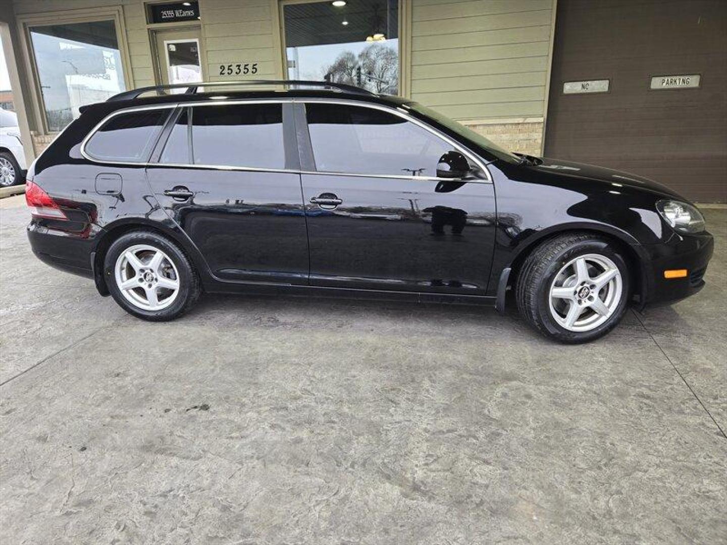 2014 Black Uni Volkswagen Jetta 2.0L TDI (3VWML7AJ4EM) with an 2.0L Diesel Turbo I4 140hp 236ft. lbs. engine, 6 Speed Manual transmission, located at 25355 Eames Street, Channahon, IL, 60410, (815) 467-1807, 41.429108, -88.228432 - Looking for a car that can tackle the daily grind without constantly stopping for gas? Look no further than the 2014 Volkswagen Jetta SportWagen TDI! With a powerful 2.0L Diesel Turbo I4 engine that cranks out 140 horses and 236 ft. lbs. of torque, you'll have all the power you need to zip through t - Photo#1