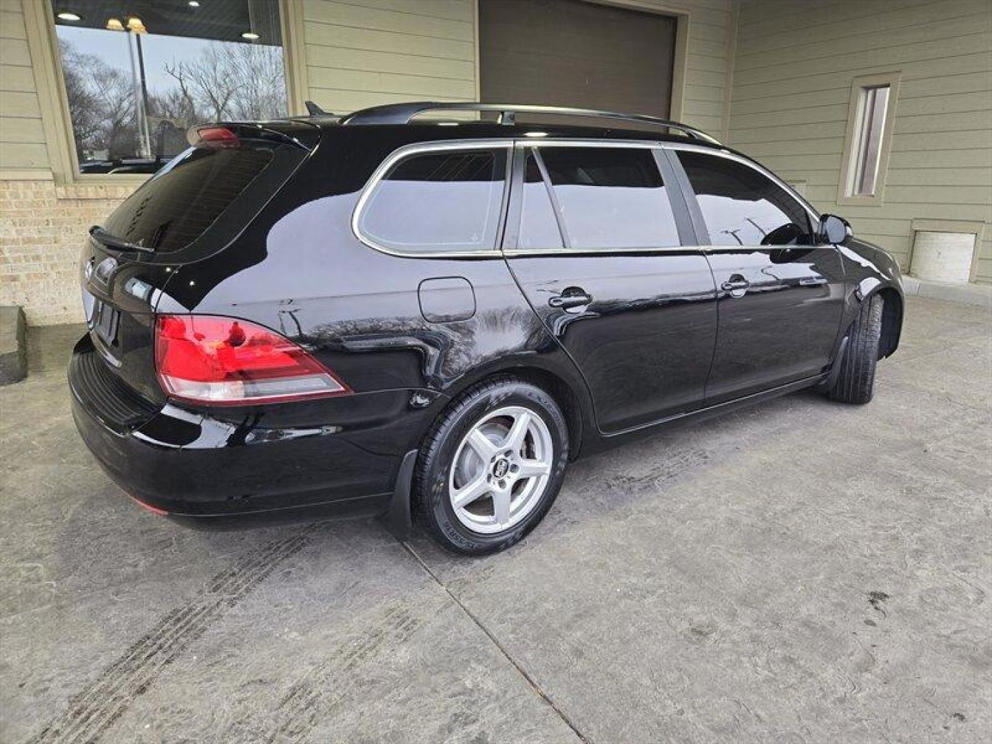 2014 Black Uni Volkswagen Jetta 2.0L TDI (3VWML7AJ4EM) with an 2.0L Diesel Turbo I4 140hp 236ft. lbs. engine, 6 Speed Manual transmission, located at 25355 Eames Street, Channahon, IL, 60410, (815) 467-1807, 41.429108, -88.228432 - Looking for a car that can tackle the daily grind without constantly stopping for gas? Look no further than the 2014 Volkswagen Jetta SportWagen TDI! With a powerful 2.0L Diesel Turbo I4 engine that cranks out 140 horses and 236 ft. lbs. of torque, you'll have all the power you need to zip through t - Photo#3