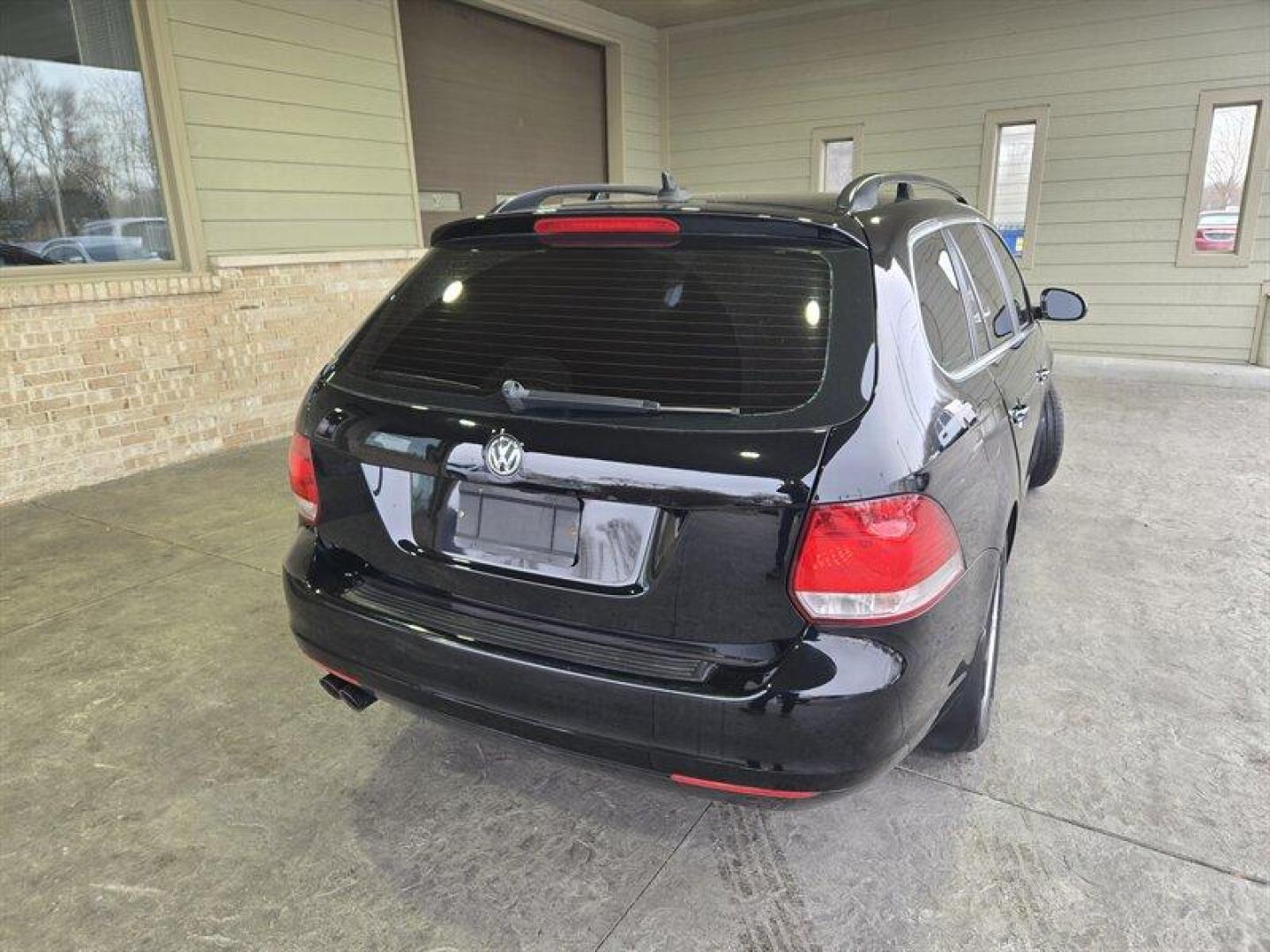 2014 Black Uni Volkswagen Jetta 2.0L TDI (3VWML7AJ4EM) with an 2.0L Diesel Turbo I4 140hp 236ft. lbs. engine, 6 Speed Manual transmission, located at 25355 Eames Street, Channahon, IL, 60410, (815) 467-1807, 41.429108, -88.228432 - Looking for a car that can tackle the daily grind without constantly stopping for gas? Look no further than the 2014 Volkswagen Jetta SportWagen TDI! With a powerful 2.0L Diesel Turbo I4 engine that cranks out 140 horses and 236 ft. lbs. of torque, you'll have all the power you need to zip through t - Photo#4