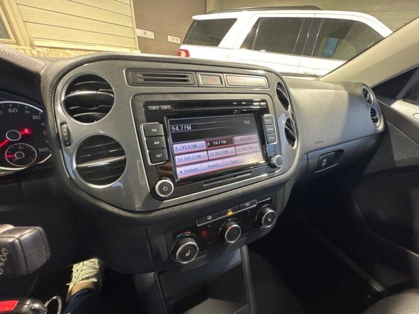 2012 Deep Black Metallic Volkswagen Tiguan S 4Motion (WVGBV7AX8CW) with an 2.0L I4 Turbo 200hp 207ft. lbs. engine, TipTronic transmission, located at 25355 Eames Street, Channahon, IL, 60410, (815) 467-1807, 41.429108, -88.228432 - Introducing the 2012 Volkswagen Tiguan S 4Motion! This baby is powered by a 2.0L I4 Turbo engine that pumps out a whopping 200 horsepower and 207 foot-pounds of torque. That's enough power to make you forget about that morning cup of coffee! But wait, there's more! This Tiguan has some sweet factor - Photo#21