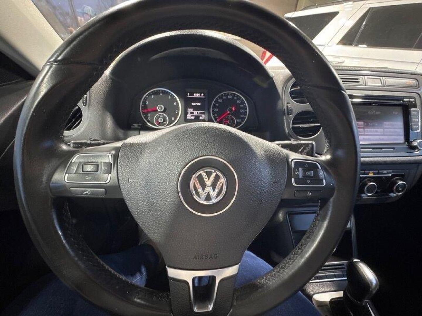 2012 Deep Black Metallic Volkswagen Tiguan S 4Motion (WVGBV7AX8CW) with an 2.0L I4 Turbo 200hp 207ft. lbs. engine, TipTronic transmission, located at 25355 Eames Street, Channahon, IL, 60410, (815) 467-1807, 41.429108, -88.228432 - Introducing the 2012 Volkswagen Tiguan S 4Motion! This baby is powered by a 2.0L I4 Turbo engine that pumps out a whopping 200 horsepower and 207 foot-pounds of torque. That's enough power to make you forget about that morning cup of coffee! But wait, there's more! This Tiguan has some sweet factor - Photo#22