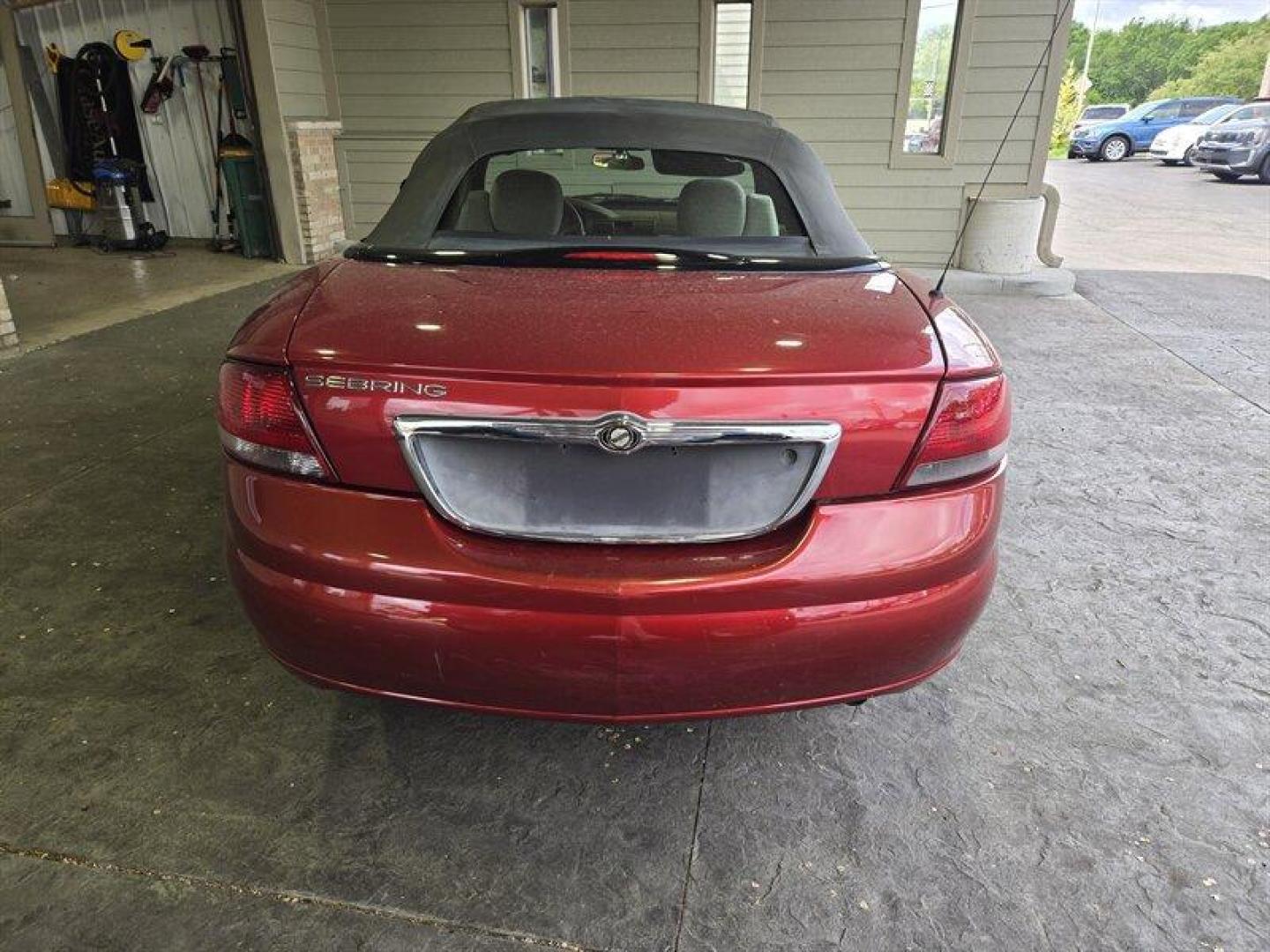 2004 Inferno Red Tinted Pearlcoat Chrysler Sebring LX (1C3EL45X74N) with an 2.4 engine, Automatic transmission, located at 25355 Eames Street, Channahon, IL, 60410, (815) 467-1807, 41.429108, -88.228432 - TRADE IN SPECIAL, THESE VEHICLES ARE SOLD AS-IS NO WARRANTY. WE WILL TRY TO DISCLOSE WHAT WE KNOW IS WRONG WITH THEM. PRICED TO MOVE. CONVERTIBLE TOP DOES NOT GO ALL THE WAY DOWN AND HAS A CUT IN IT, CAR ALSO HAS SOME OIL LEAKES, AND NEEDS BRAKES *NO FINANCING AVAILABLE. NO SHIPPING AVAILABLE* - Photo#4