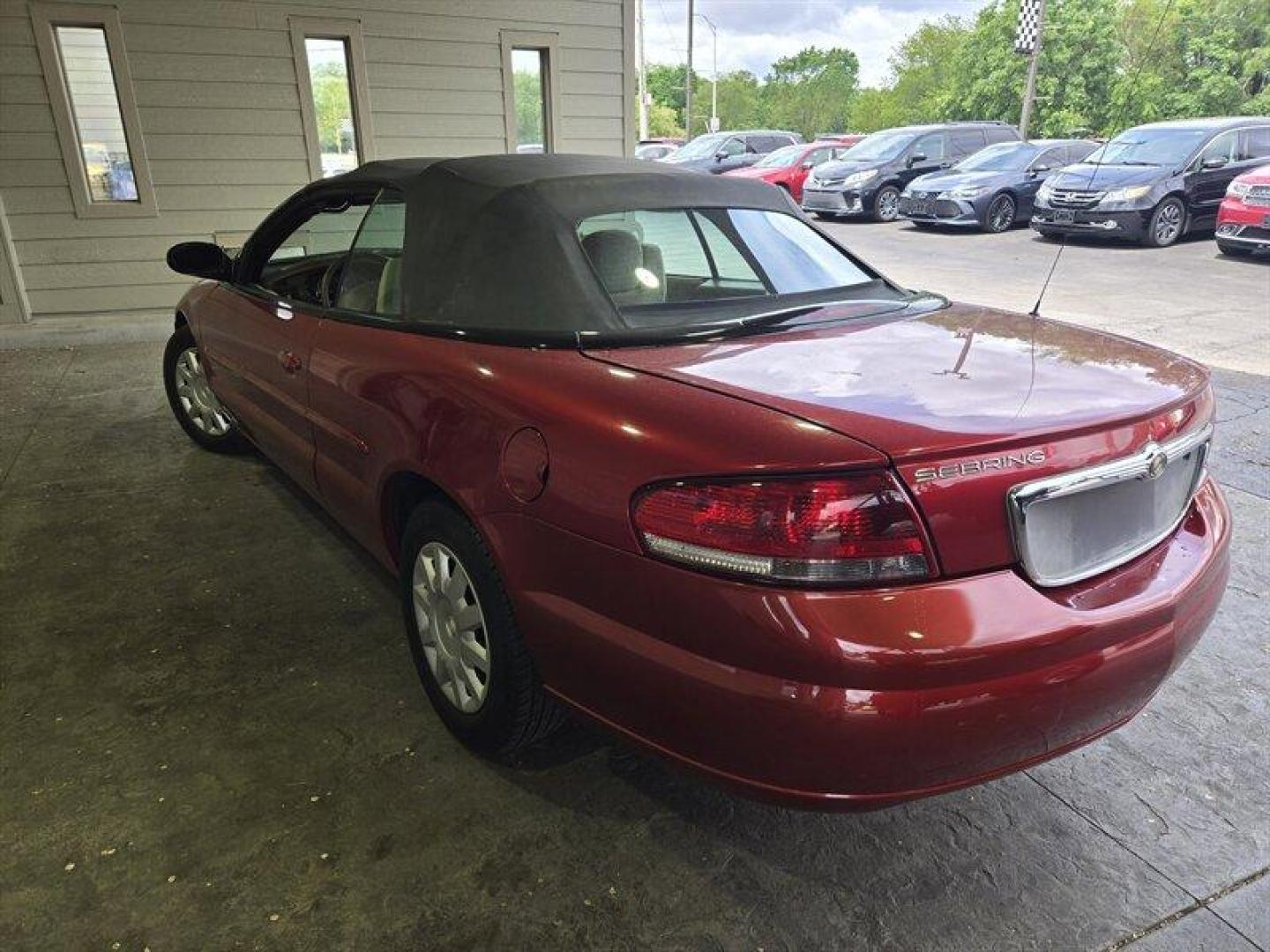 2004 Inferno Red Tinted Pearlcoat Chrysler Sebring LX (1C3EL45X74N) with an 2.4 engine, Automatic transmission, located at 25355 Eames Street, Channahon, IL, 60410, (815) 467-1807, 41.429108, -88.228432 - TRADE IN SPECIAL, THESE VEHICLES ARE SOLD AS-IS NO WARRANTY. WE WILL TRY TO DISCLOSE WHAT WE KNOW IS WRONG WITH THEM. PRICED TO MOVE. CONVERTIBLE TOP DOES NOT GO ALL THE WAY DOWN AND HAS A CUT IN IT, CAR ALSO HAS SOME OIL LEAKES, AND NEEDS BRAKES *NO FINANCING AVAILABLE. NO SHIPPING AVAILABLE* - Photo#5