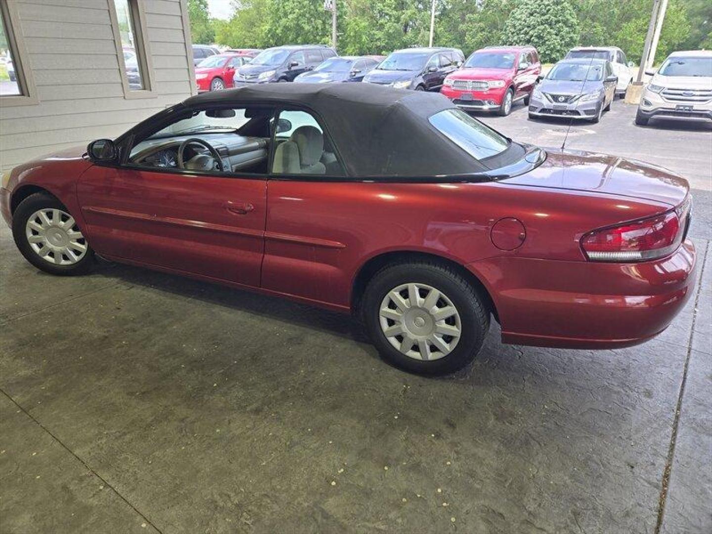 2004 Inferno Red Tinted Pearlcoat Chrysler Sebring LX (1C3EL45X74N) with an 2.4 engine, Automatic transmission, located at 25355 Eames Street, Channahon, IL, 60410, (815) 467-1807, 41.429108, -88.228432 - TRADE IN SPECIAL, THESE VEHICLES ARE SOLD AS-IS NO WARRANTY. WE WILL TRY TO DISCLOSE WHAT WE KNOW IS WRONG WITH THEM. PRICED TO MOVE. CONVERTIBLE TOP DOES NOT GO ALL THE WAY DOWN AND HAS A CUT IN IT, CAR ALSO HAS SOME OIL LEAKES, AND NEEDS BRAKES *NO FINANCING AVAILABLE. NO SHIPPING AVAILABLE* - Photo#6