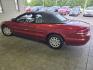 2004 Inferno Red Tinted Pearlcoat Chrysler Sebring LX (1C3EL45X74N) with an 2.4 engine, Automatic transmission, located at 25355 Eames Street, Channahon, IL, 60410, (815) 467-1807, 41.429108, -88.228432 - TRADE IN SPECIAL, THESE VEHICLES ARE SOLD AS-IS NO WARRANTY. WE WILL TRY TO DISCLOSE WHAT WE KNOW IS WRONG WITH THEM. PRICED TO MOVE. CONVERTIBLE TOP DOES NOT GO ALL THE WAY DOWN AND HAS A CUT IN IT, CAR ALSO HAS SOME OIL LEAKES, AND NEEDS BRAKES *NO FINANCING AVAILABLE. NO SHIPPING AVAILABLE* - Photo#6