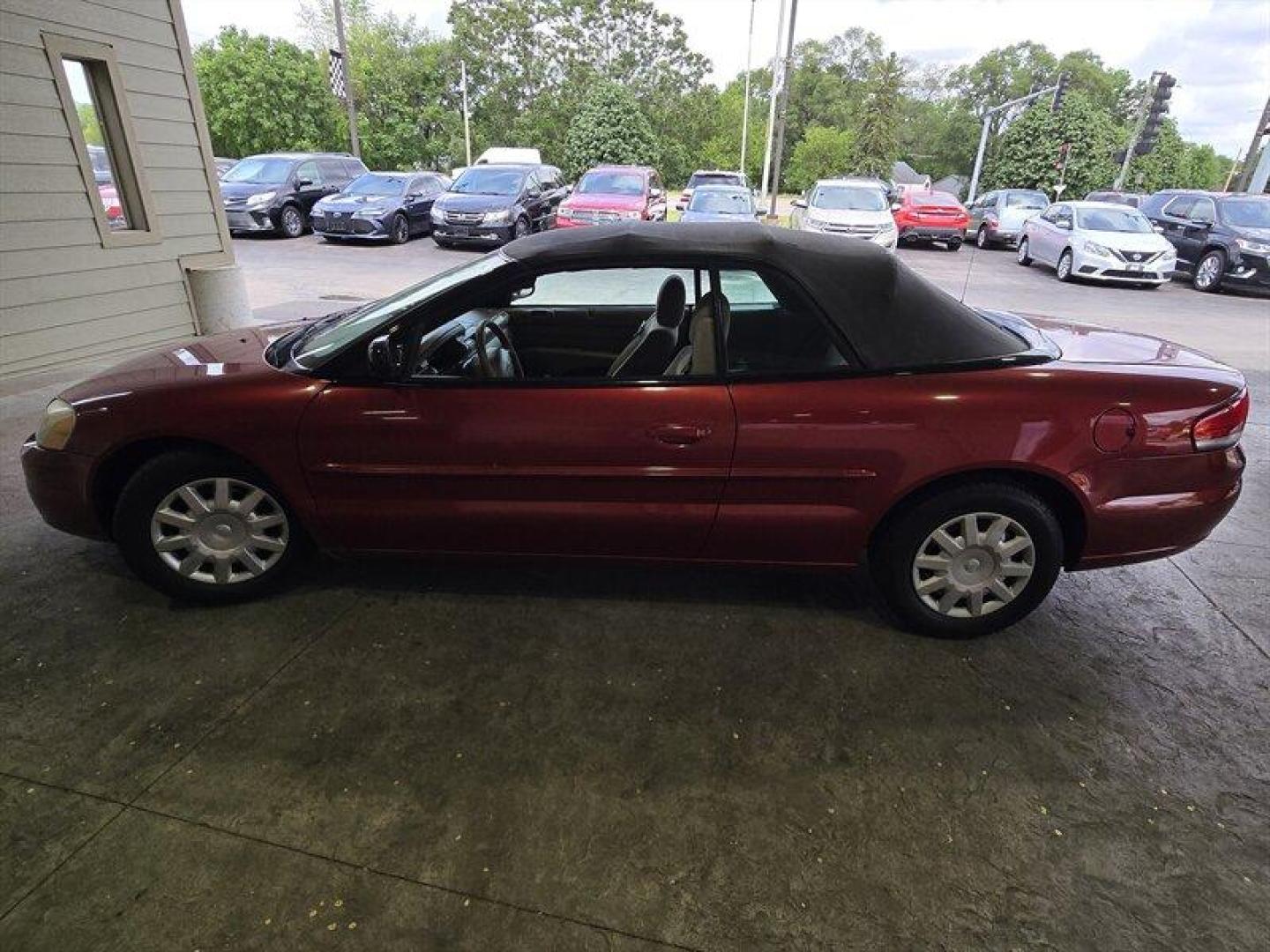 2004 Inferno Red Tinted Pearlcoat Chrysler Sebring LX (1C3EL45X74N) with an 2.4 engine, Automatic transmission, located at 25355 Eames Street, Channahon, IL, 60410, (815) 467-1807, 41.429108, -88.228432 - TRADE IN SPECIAL, THESE VEHICLES ARE SOLD AS-IS NO WARRANTY. WE WILL TRY TO DISCLOSE WHAT WE KNOW IS WRONG WITH THEM. PRICED TO MOVE. CONVERTIBLE TOP DOES NOT GO ALL THE WAY DOWN AND HAS A CUT IN IT, CAR ALSO HAS SOME OIL LEAKES, AND NEEDS BRAKES *NO FINANCING AVAILABLE. NO SHIPPING AVAILABLE* - Photo#7