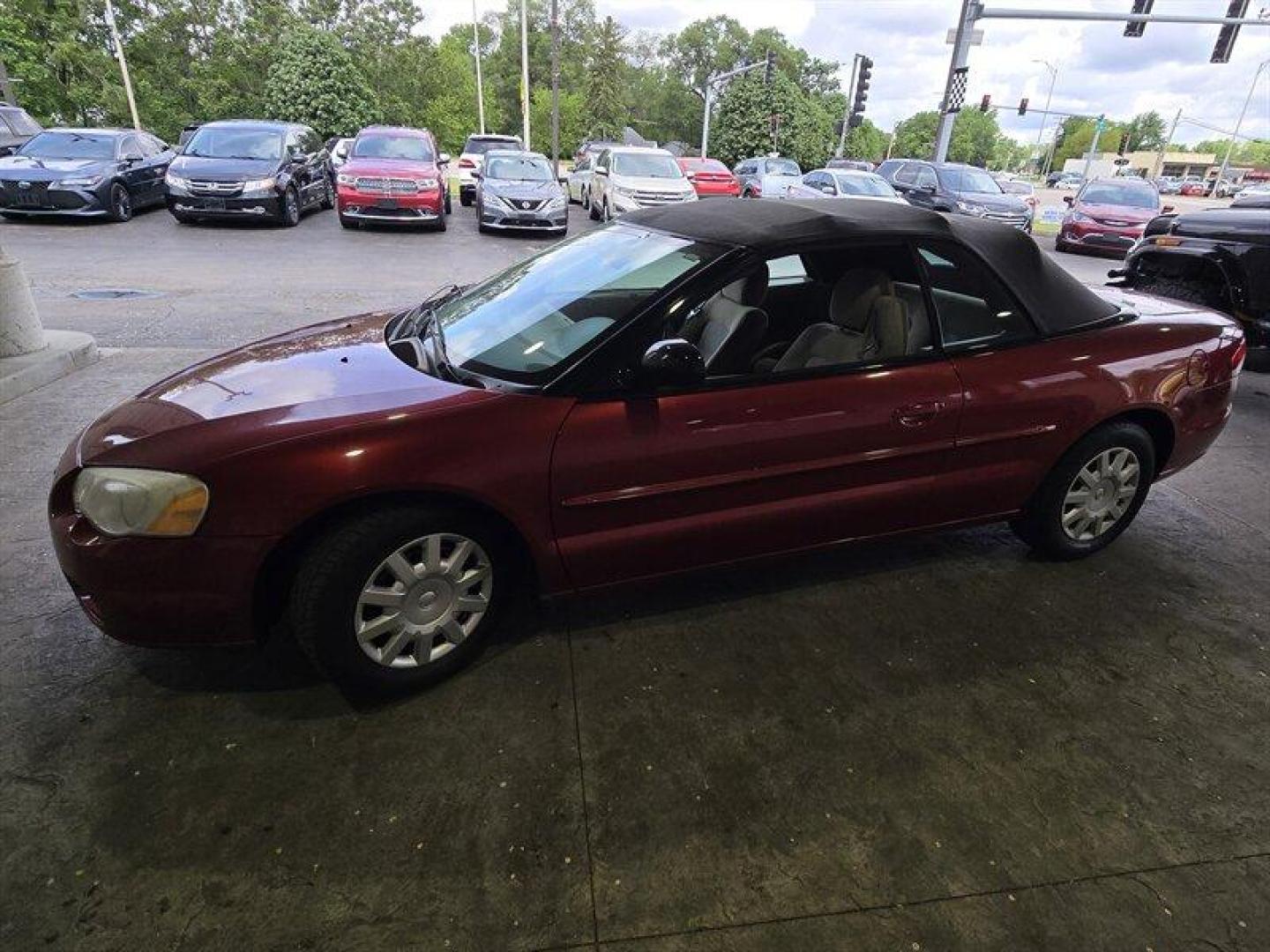 2004 Inferno Red Tinted Pearlcoat Chrysler Sebring LX (1C3EL45X74N) with an 2.4 engine, Automatic transmission, located at 25355 Eames Street, Channahon, IL, 60410, (815) 467-1807, 41.429108, -88.228432 - TRADE IN SPECIAL, THESE VEHICLES ARE SOLD AS-IS NO WARRANTY. WE WILL TRY TO DISCLOSE WHAT WE KNOW IS WRONG WITH THEM. PRICED TO MOVE. CONVERTIBLE TOP DOES NOT GO ALL THE WAY DOWN AND HAS A CUT IN IT, CAR ALSO HAS SOME OIL LEAKES, AND NEEDS BRAKES *NO FINANCING AVAILABLE. NO SHIPPING AVAILABLE* - Photo#8