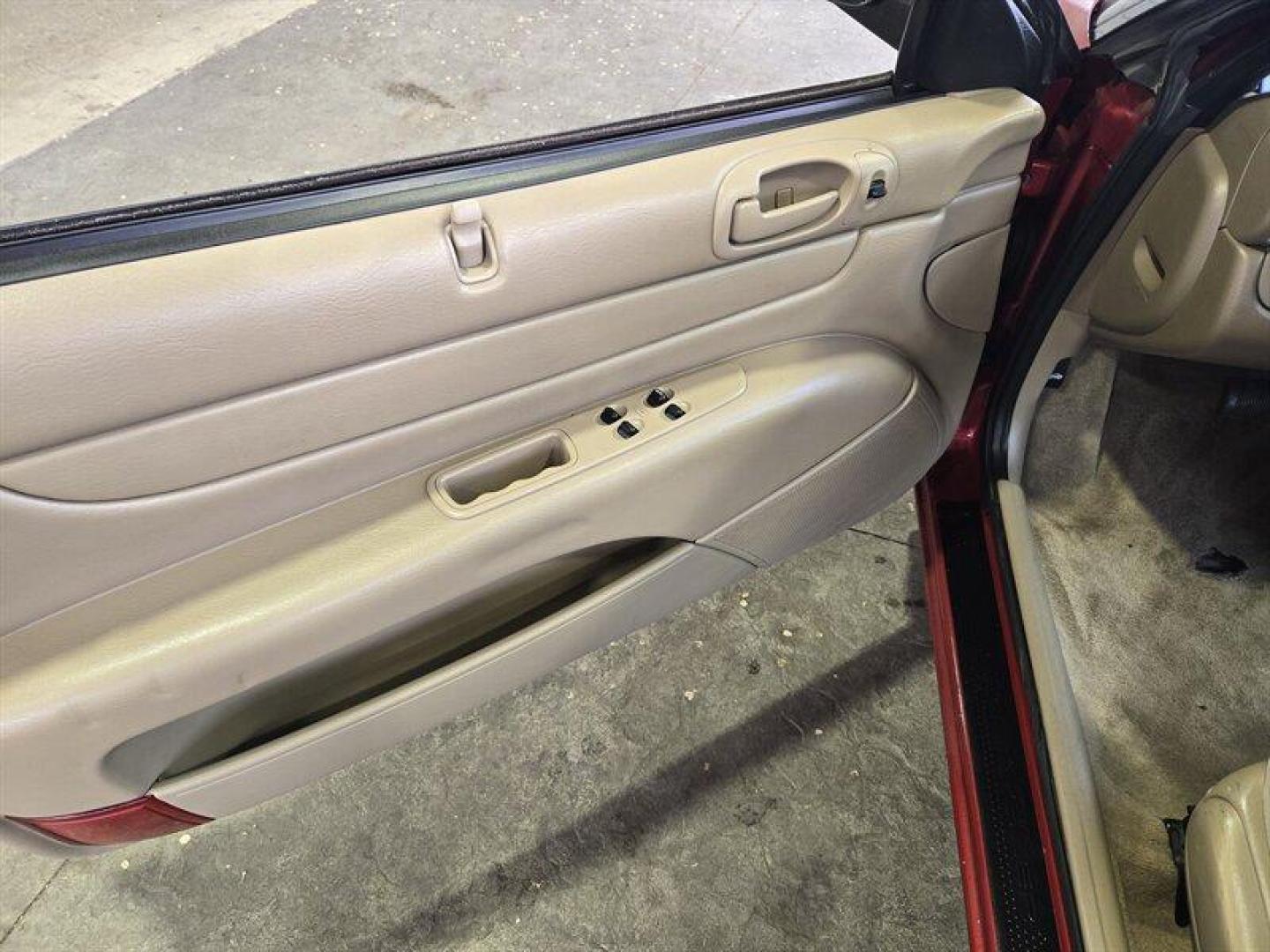 2004 Inferno Red Tinted Pearlcoat Chrysler Sebring LX (1C3EL45X74N) with an 2.4 engine, Automatic transmission, located at 25355 Eames Street, Channahon, IL, 60410, (815) 467-1807, 41.429108, -88.228432 - TRADE IN SPECIAL, THESE VEHICLES ARE SOLD AS-IS NO WARRANTY. WE WILL TRY TO DISCLOSE WHAT WE KNOW IS WRONG WITH THEM. PRICED TO MOVE. CONVERTIBLE TOP DOES NOT GO ALL THE WAY DOWN AND HAS A CUT IN IT, CAR ALSO HAS SOME OIL LEAKES, AND NEEDS BRAKES *NO FINANCING AVAILABLE. NO SHIPPING AVAILABLE* - Photo#14